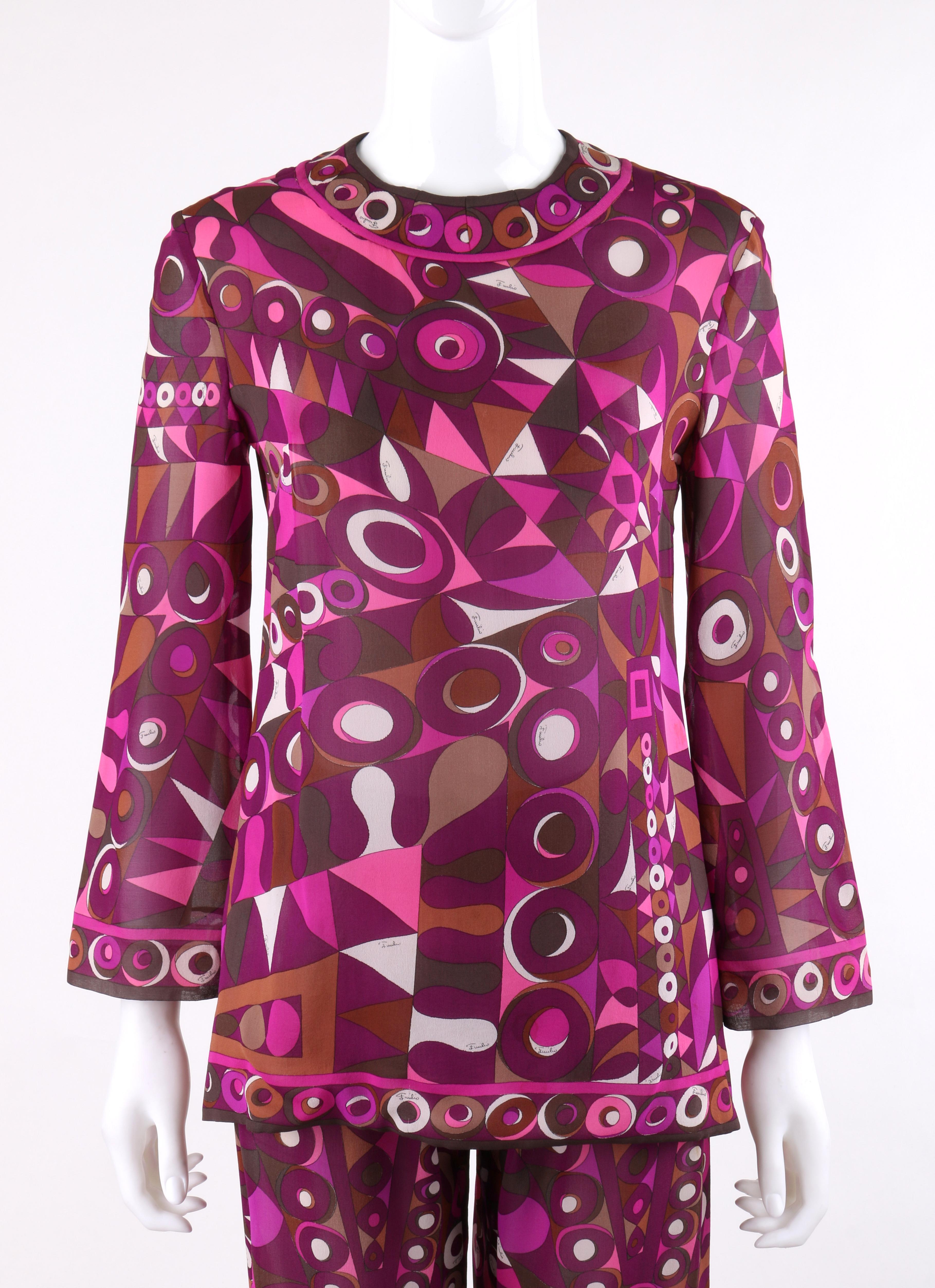EMILIO PUCCI c.1960's 2pc Purple Multicolor Op Art Silk Blouse Pants Leisure Set Ensemble
 
Circa: c.1960’s
Label(s): Label has been removed
Style: Ensemble/suit set
Color(s): Shades of purple, brown, pink, and white
Lined: Yes (pants)
Unmarked
