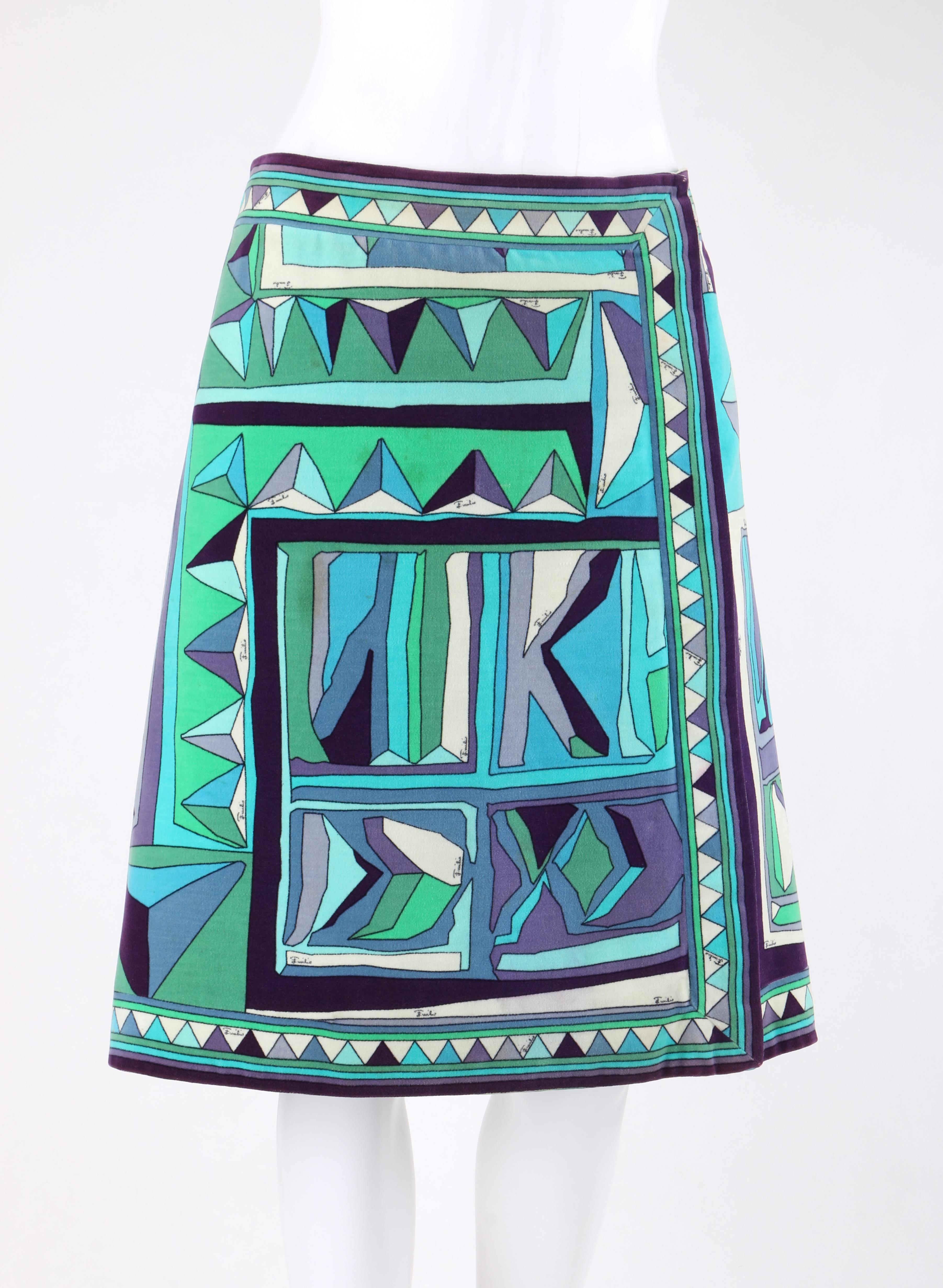 EMILIO PUCCI c.1960's Blue Multicolor Signature Print Velvet A-Line Wrap Skirt
 
Circa: c.1960’s
Label(s): Emilio Pucci Exclusively for Saks Fifth Avenue
Style: Wrap skirt
Color(s): Shades of blue, green, purple, and white
Lined: Yes
Marked Fabric