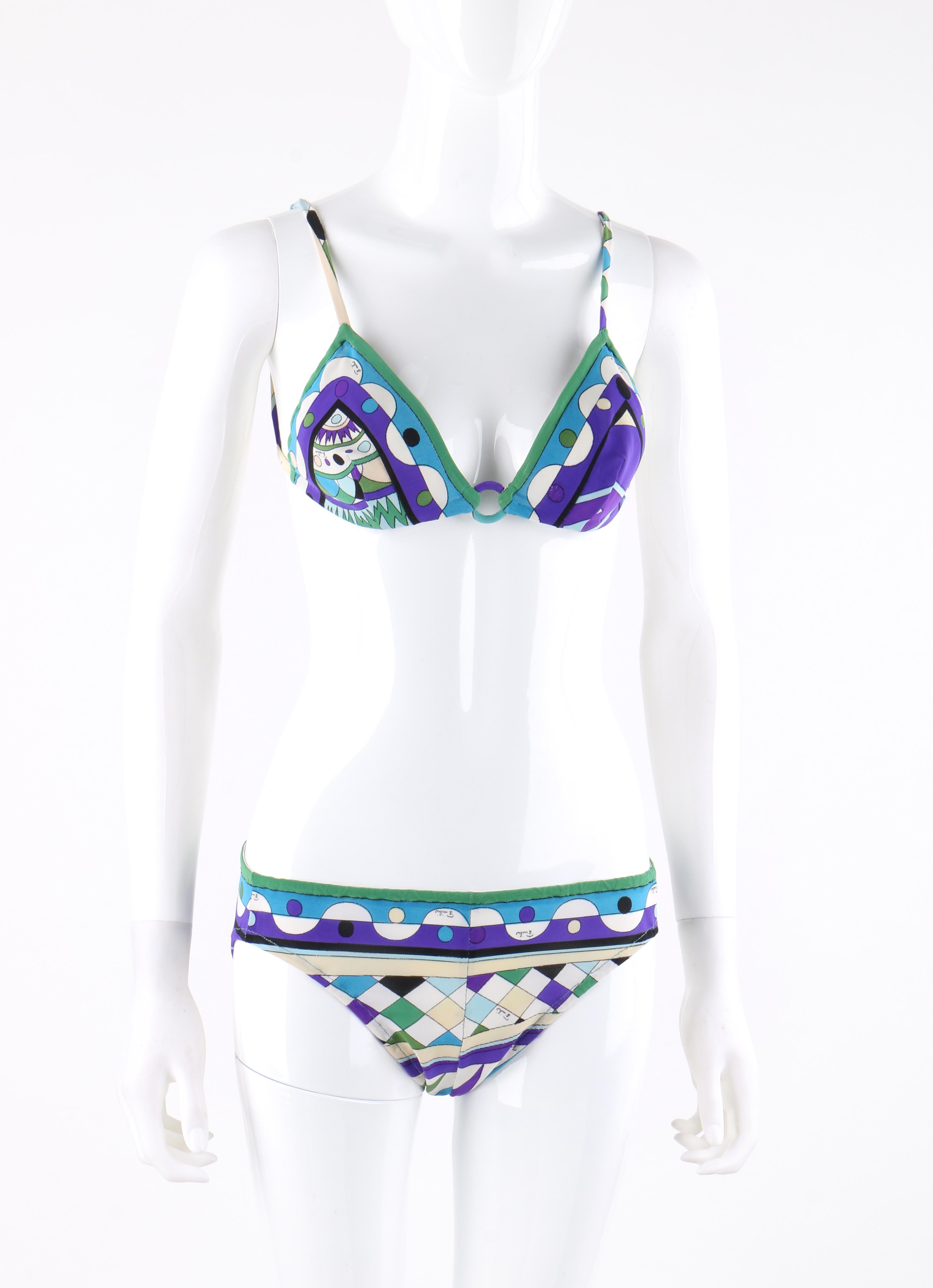 EMILIO PUCCI c.1960’s Blue Signature Print 2 Piece Bikini Bathing Suit Swimsuit
 
Circa: 1960’s
Label(s): Emilio Pucci / Neiman Marcus Trophy Room   
Style: Bikini	
Color(s): Shades of blue, green, purple, tan and off-white
Lined: Yes
Marked Fabric