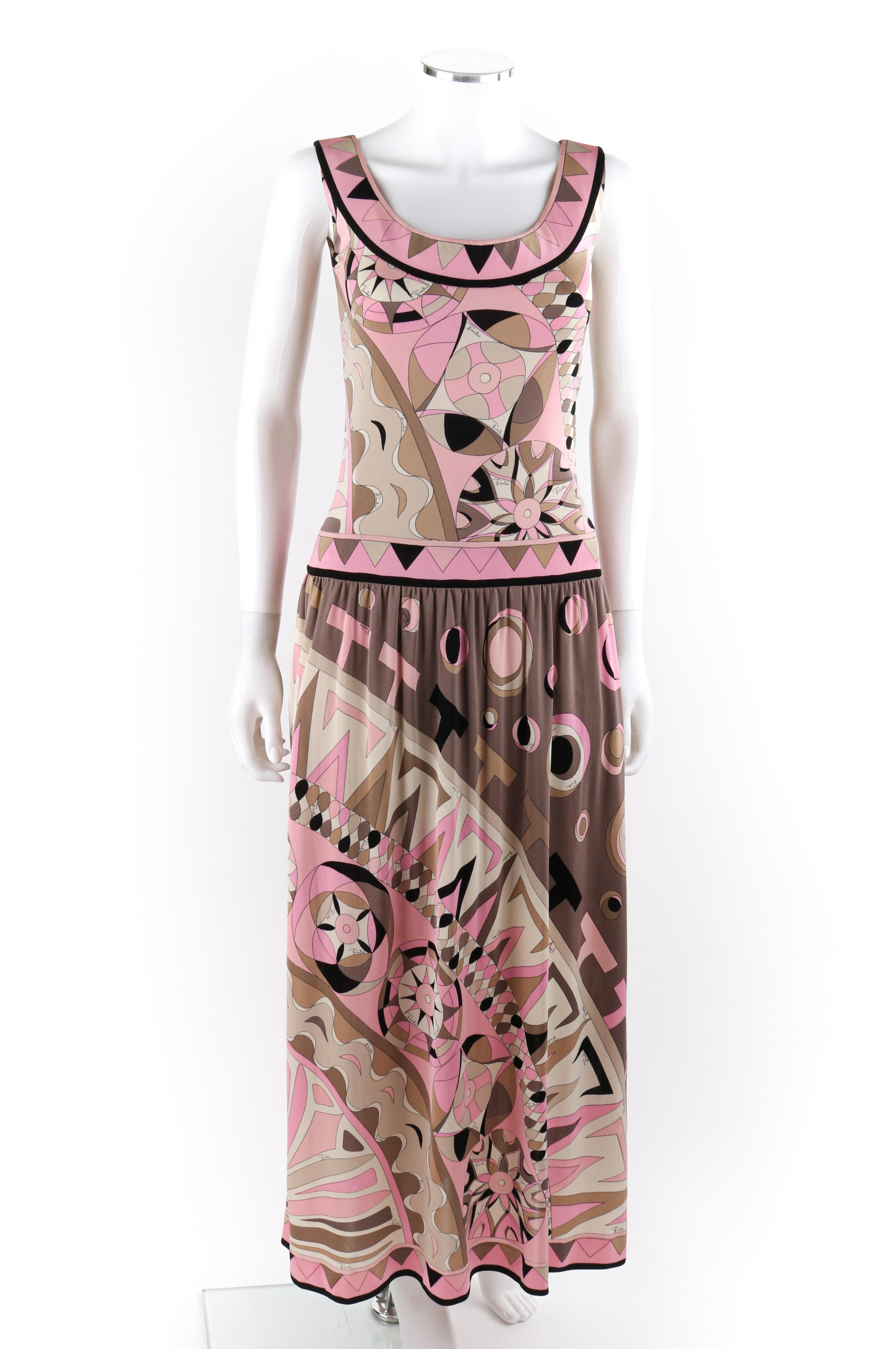 EMILIO PUCCI c.1960's Circular Op Art Signature Print Silk Drop Waist Maxi Dress
 
Circa: 1960’s
Label(s): Emilio Pucci, Exclusively for Saks Fifth Avenue
Designer: Emilio Pucci
Style: Maxi dress
Color(s): Shades of pink, brown, white, black