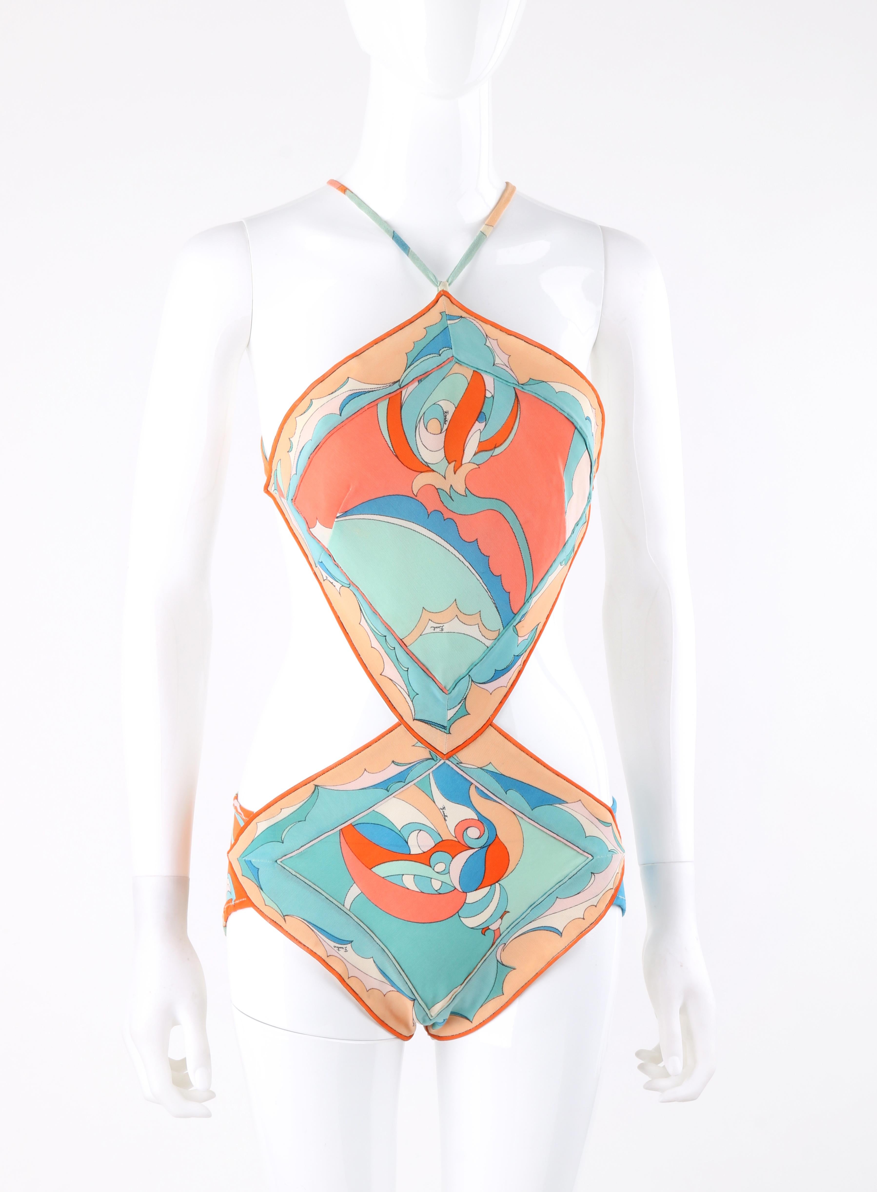 EMILIO PUCCI c.1960’s Coral Teal Signature Print Diamond Cut One-Piece Swimsuit  
 
Circa: 1960’s
Label(s): Emilio Pucci / Made In Italy For Lord & Taylor  
Style: One Piece Bathing Swimsuit 
Color(s): Shades of orange, coral, teal green, blue, pink