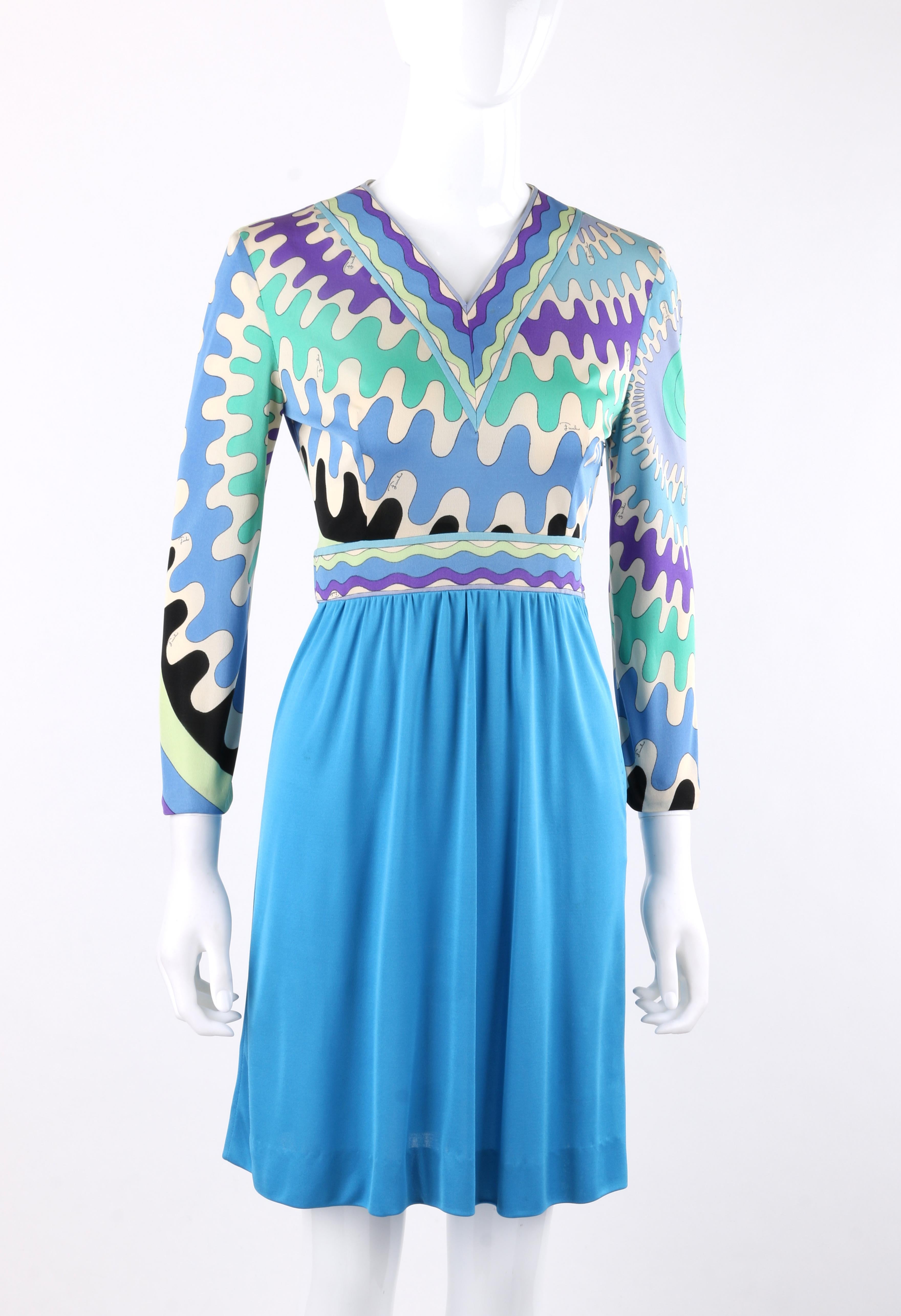 DESCRIPTION: EMILIO PUCCI c.1960's Mod Op Art Signature Print Silk Jersey Knit Shift Dress
 
Circa: c.1960’s
Label(s): Emilio Pucci; Made in Italy for Lord & Taylor 
Designer: Emilio Pucci
Style: Shift dress
Color(s): Multi in shades of blue, green,
