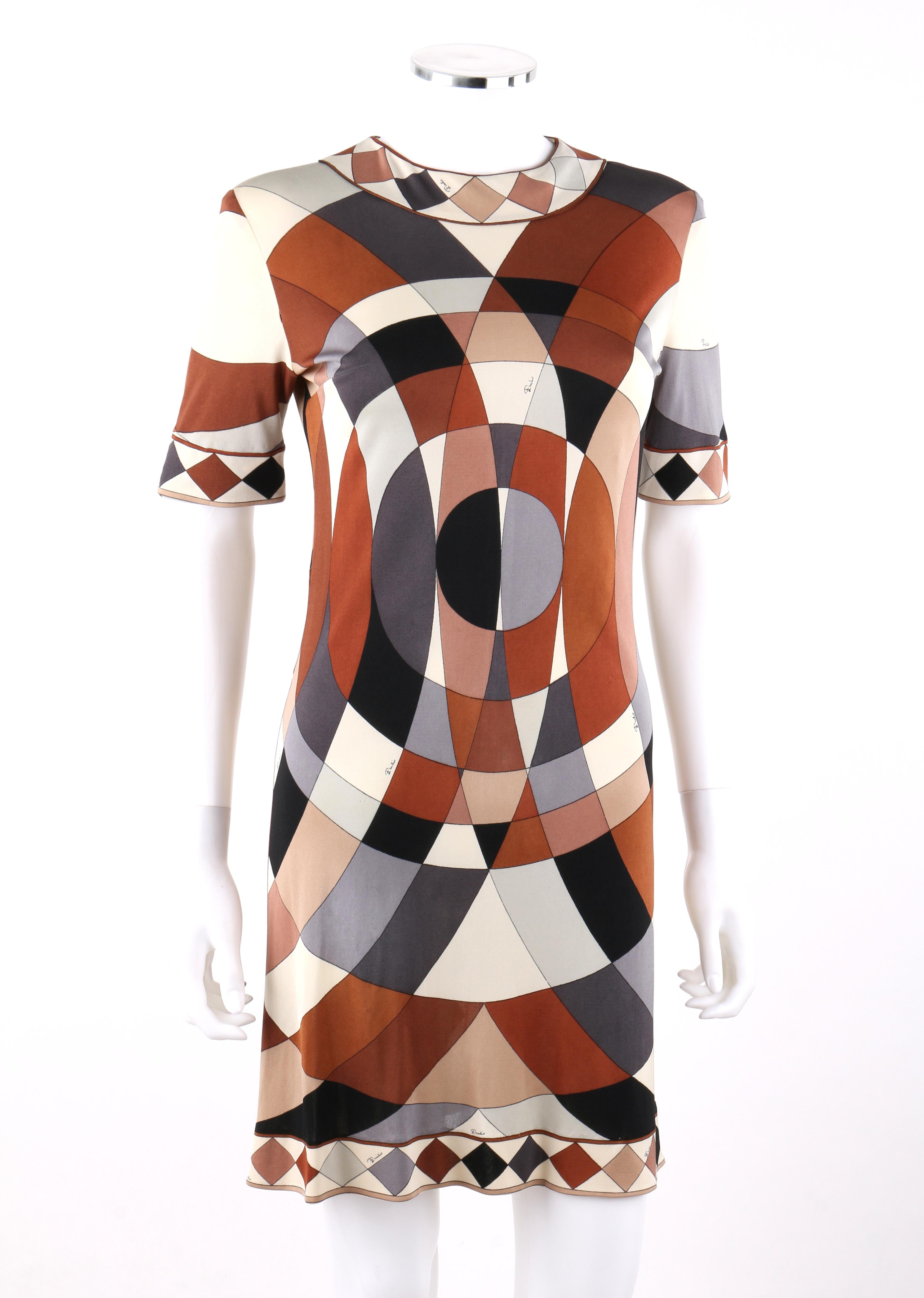 EMILIO PUCCI c.1960’s Multi-color Op Art Signature Print Silk Jersey Shift Dress  
 
Circa: 1960’s
Label(s): Emilio Pucci
Style: Shift Dress
Color(s): Shades of brown, cream, grey and black.
Lined: No
Marked Fabric Content: 100% Silk 
Additional