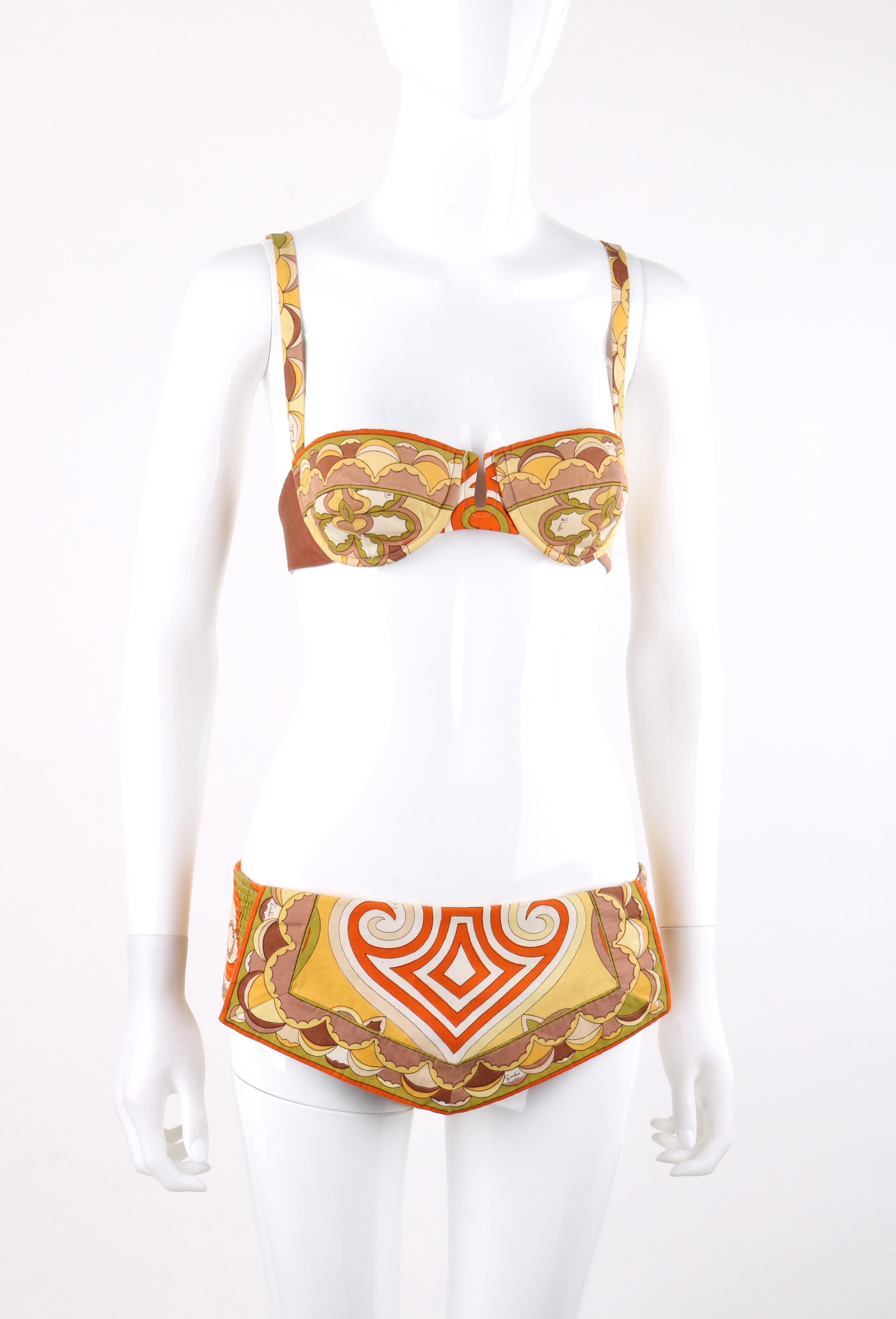 EMILIO PUCCI c.1960’s Multi-color Signature Print Two Piece Bikini Swimsuit
 
Circa: 1960’s
Label(s): Emilio Pucci / Made in Italy - Exclusively for Sak’s Fifth Ave. 
Style: Bikini
Color(s): Shades of brown, orange, yellow, green, off-white and