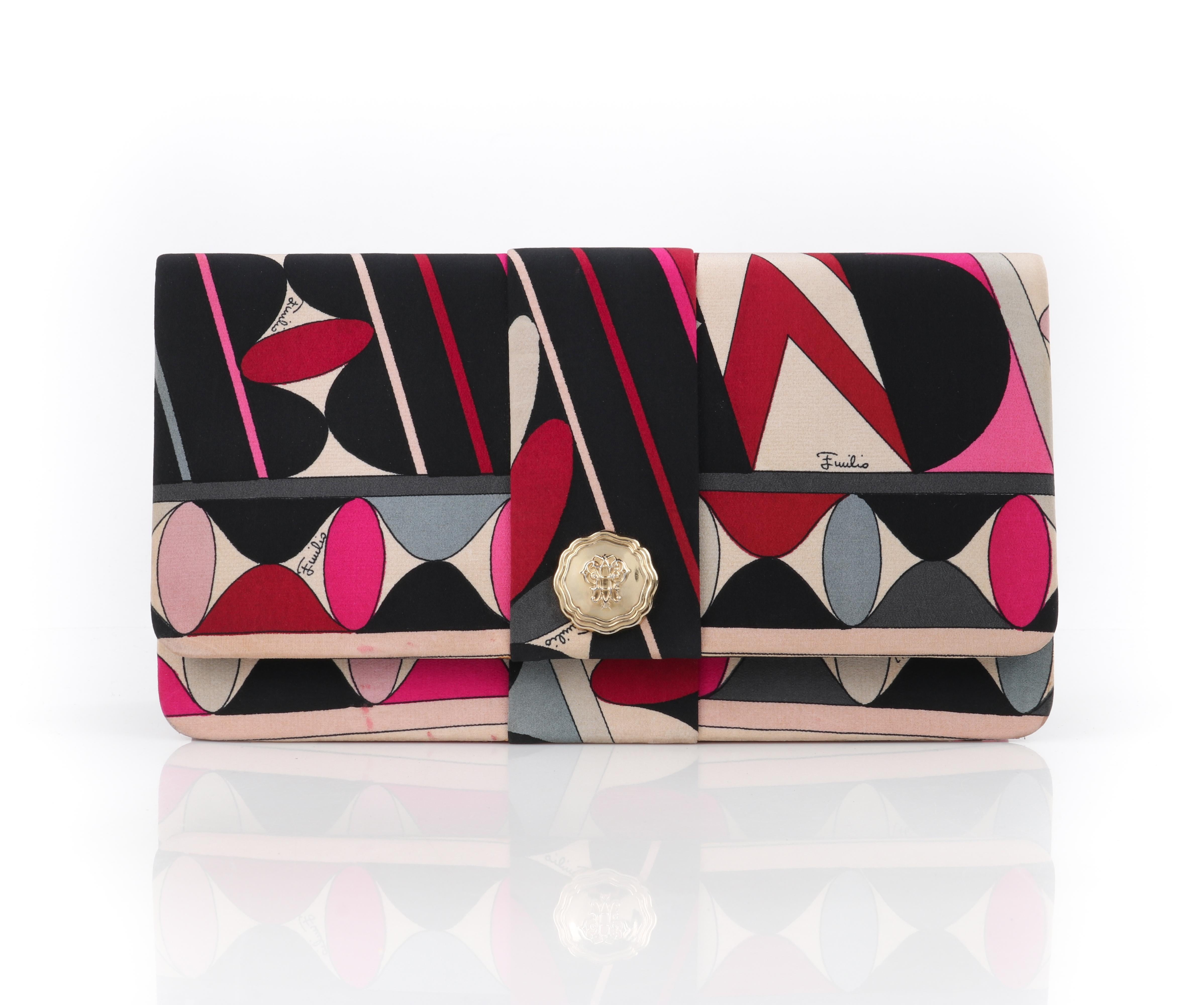 EMILIO PUCCI c.1960’s Multicolor Geometric Op Art Logo Silk Foldover Clutch Bag
 
Brand/Manufacturer: Emilio Pucci 
Circa: 1960’s
Designer: Emilio Pucci
Style: Clutch
Color(s): Exterior: shades of blue, black, pink, red, gray, cream, gold; Interior: