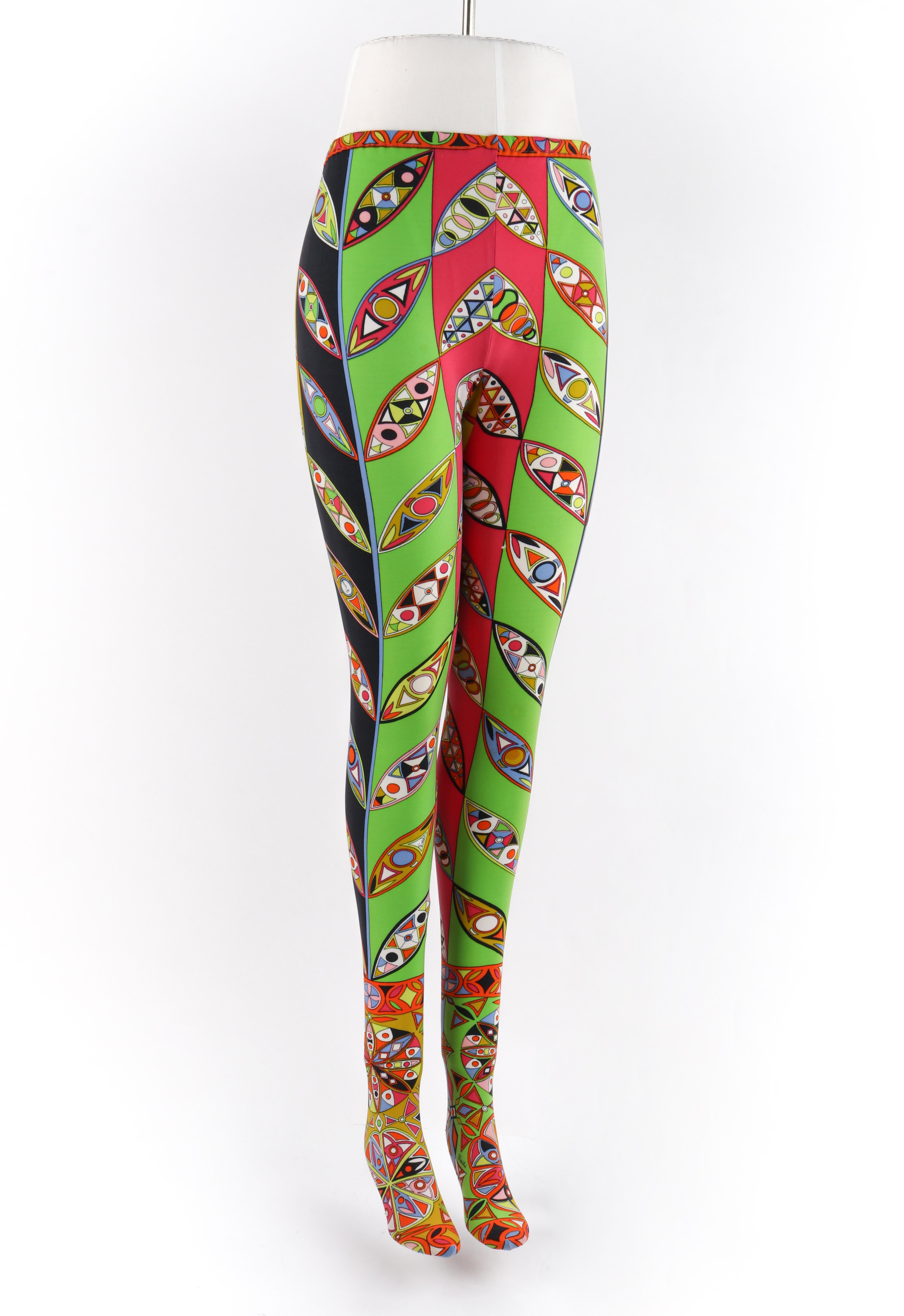 EMILIO PUCCI c.1960’s Multicolor Signature Kaleidoscope Print Stocking Leggings
Circa: 1960’s
Label(s): Emilio Pucci, Saks Fifth Avenue
Designer: Emilio Pucci
Style: Tights/leggings
Color(s): Shades of white, blue, pink, green, orange, yellow, and