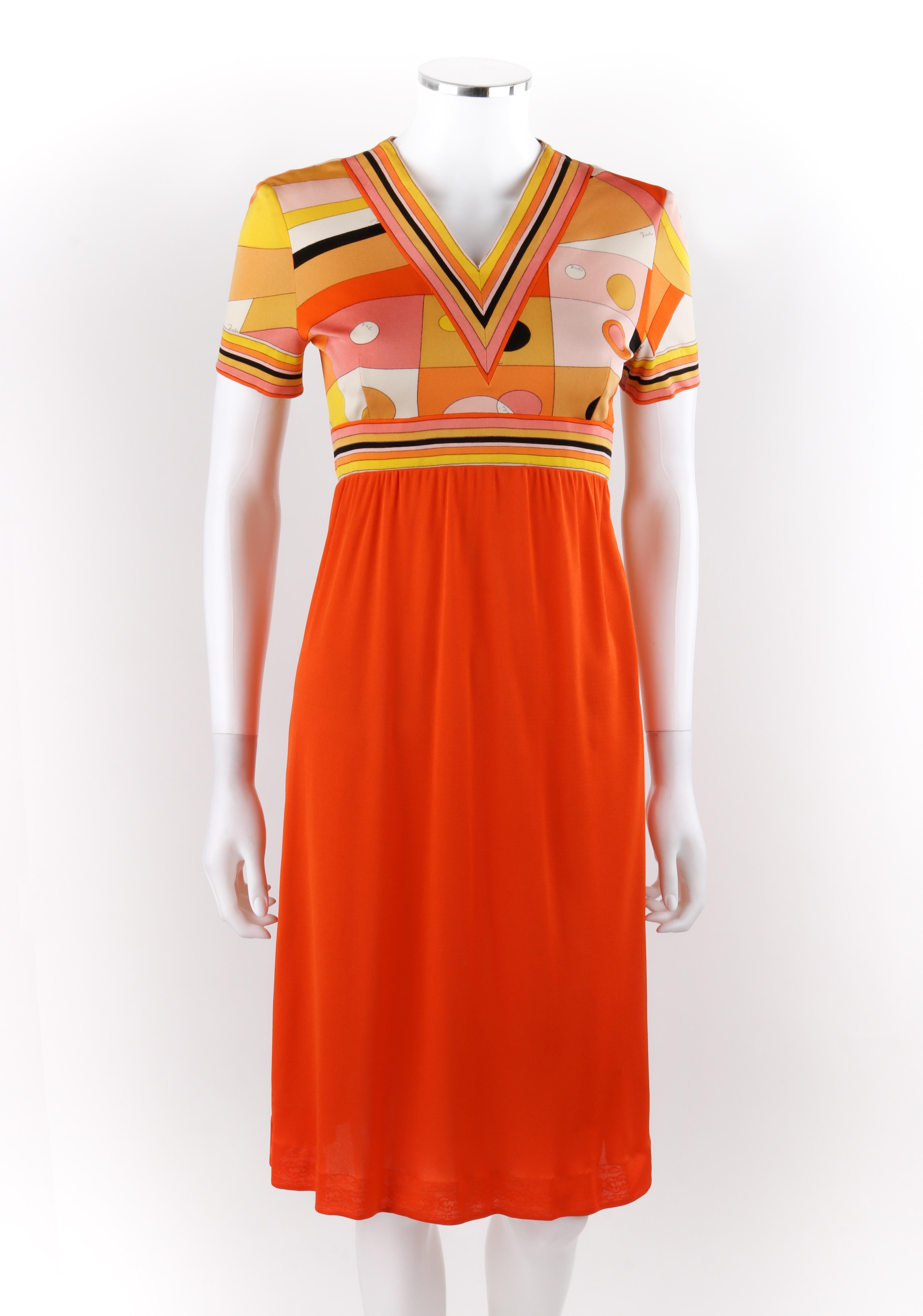 EMILIO PUCCI c.1960's Orange Geometric Op Art Signature Print Silk Empire Dress
 
Circa: 1960’s
Label(s): Emilio Pucci; Made of Lord & Taylor
Designer: Emilio Pucci
Style: Empire dress
Color(s): Shades of orange, yellow, pink, white, black
Lined: