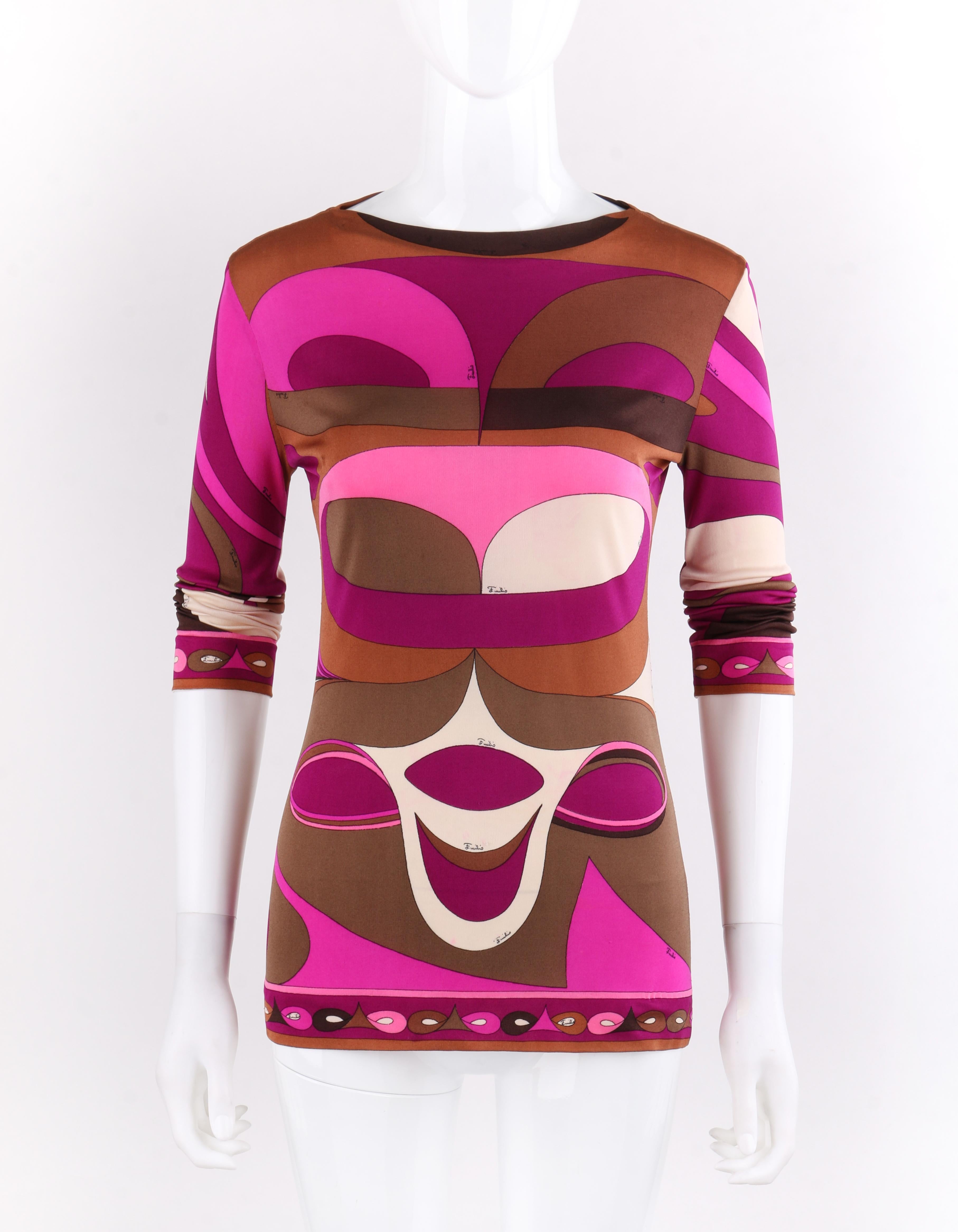 EMILIO PUCCI c.1960's Pink Signature Op Art Silk Long Sleeve Top
 
Circa: 1960’s
Label(s): Emilio Pucci; For Lord & Taylor
Designer: Emilio Pucci
Style: Long sleeve top
Color(s): Shades of pink, brown, black, white (exterior, interior)
Lined: