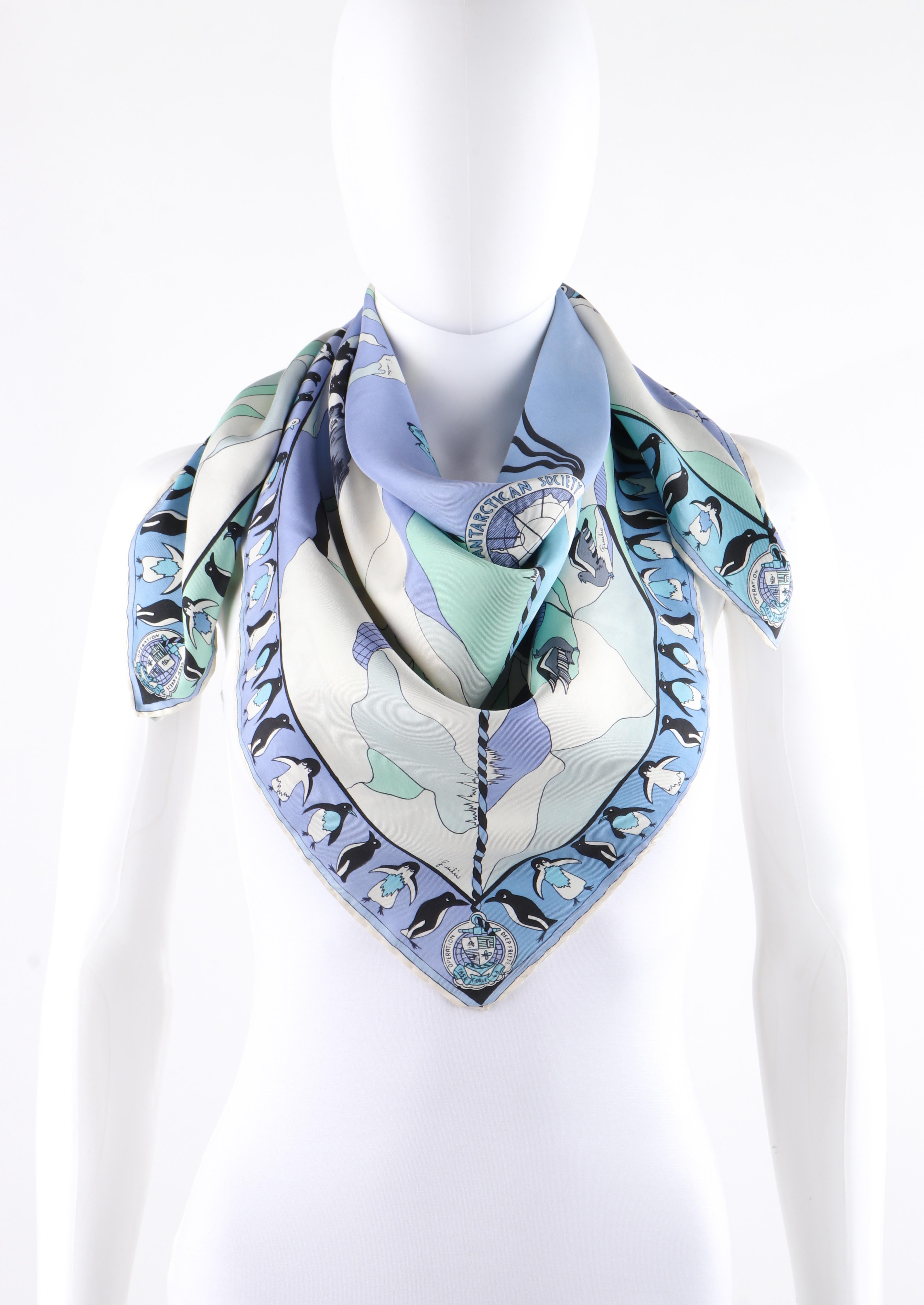 EMILIO PUCCI c.1960’s “The Antarctican Society” Antarctic Motif Print Silk Scarf
 
Brand/Manufacturer: Emilio Pucci
Circa: 1960’s 
Designer: Emilio Pucci
Style: Square silk scarf
Color(s): Shades of blue, green, gray, purple, black, and white
Lined: