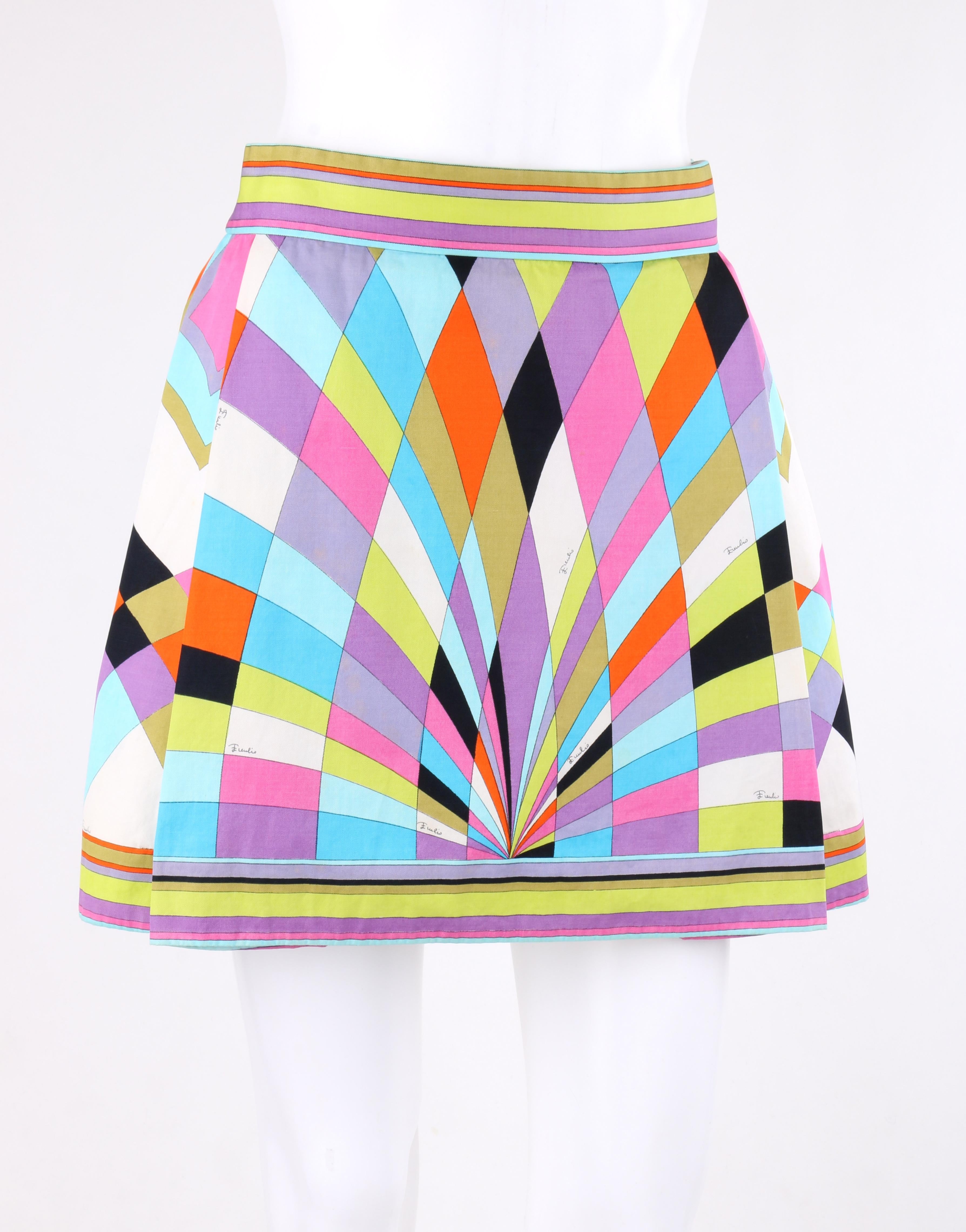 EMILIO PUCCI c.1965 Multicolor Geometric Signature Print A-Line Mini Skirt
 
Circa: c.1965
Label(s): Emilio Pucci & Exclusively for Saks Fifth Avenue
Style: Mini skirt
Color(s): Shades of pink, purple, orange, green, blue, black, and white
Lined: