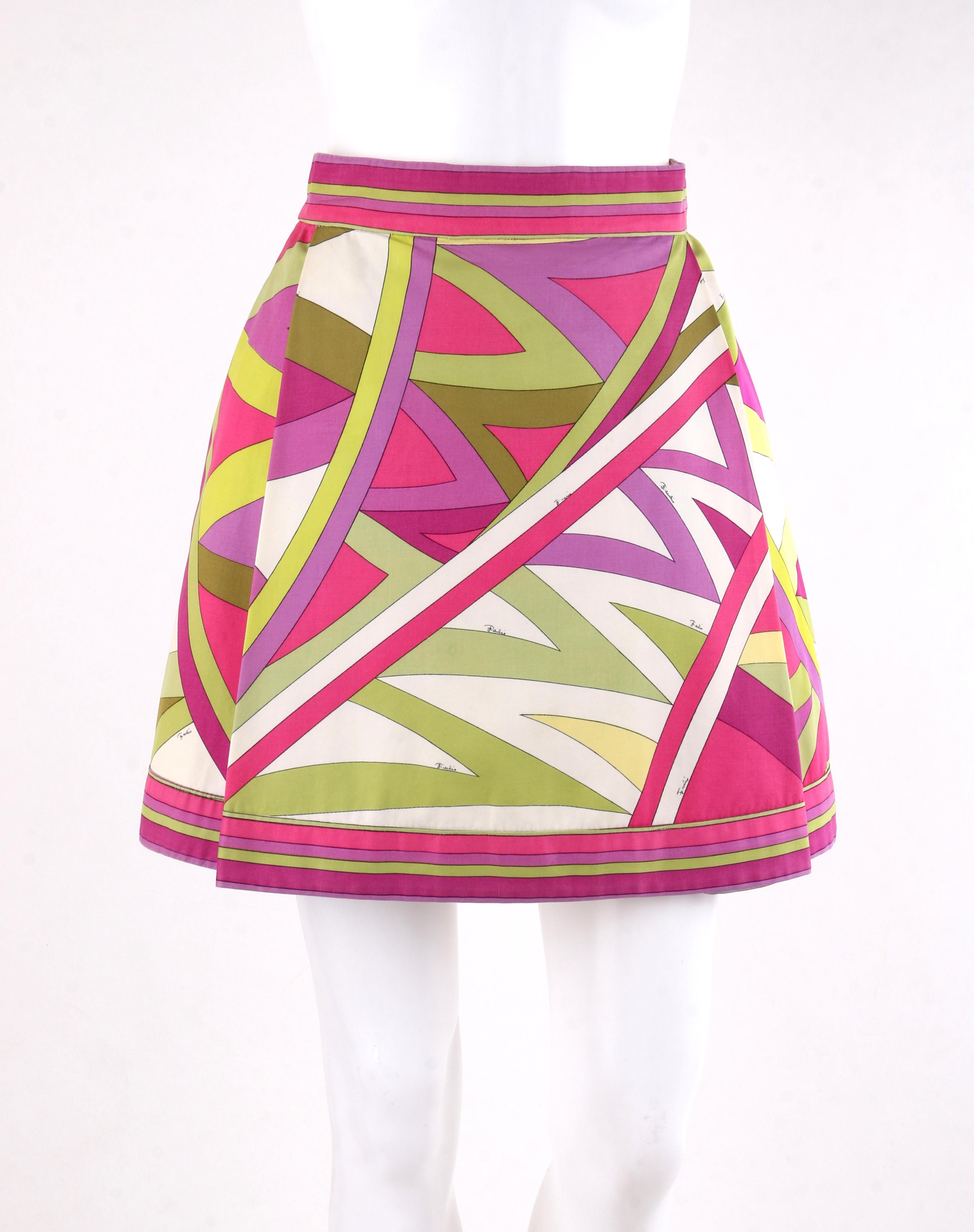DESCRIPTION: EMILIO PUCCI c.1969 “Arcate” Signature Print Pink Op Art A-Line Mini Skirt
 
Circa: 1969
Label(s): Emilio Pucci / Exclusively for Saks Fifth Avenue   
Style: Mini skirt
Color(s): Shades of pink, purple, green, white and black. 
Lined: