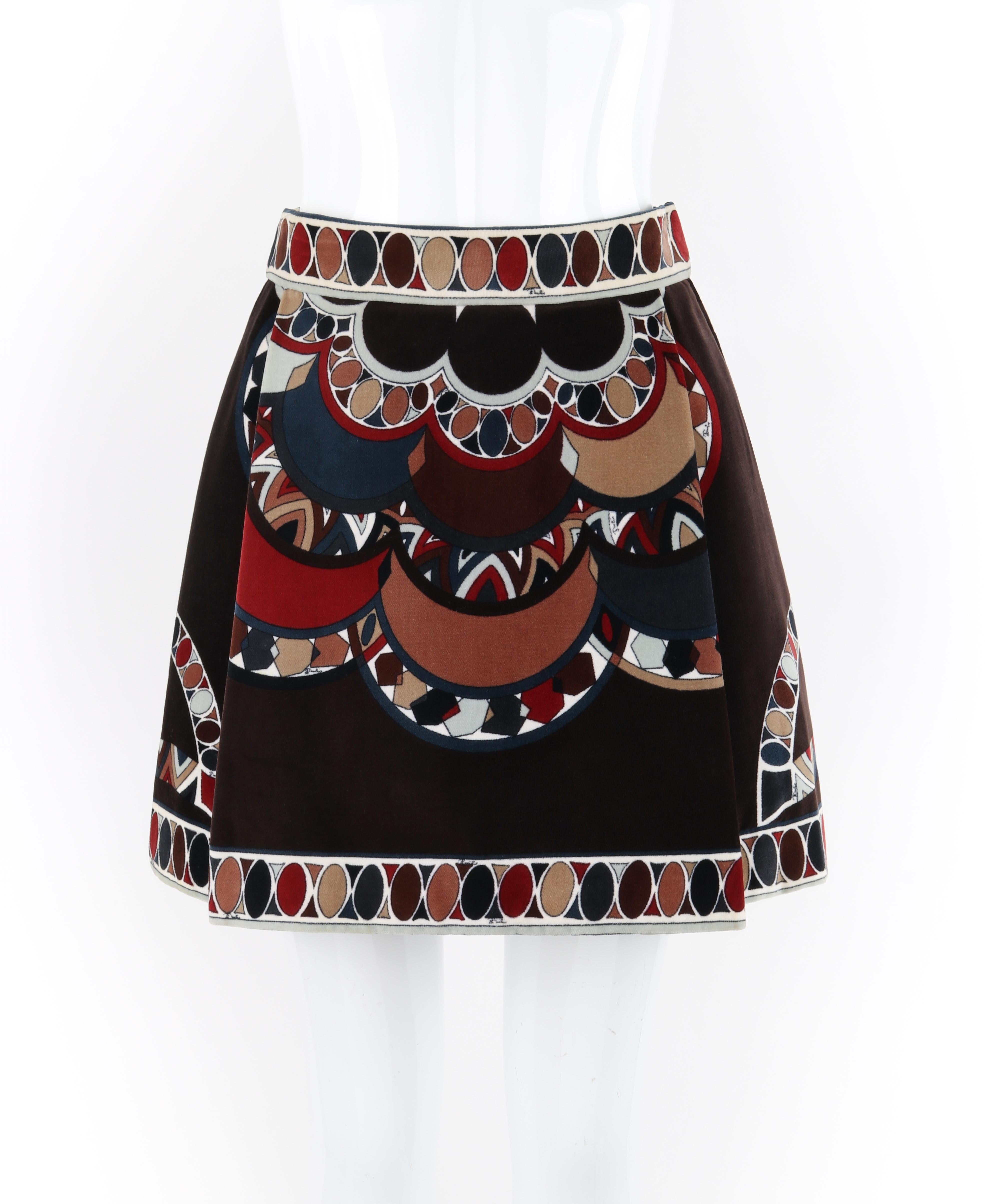 EMILIO PUCCI c.1969 Brown Multicolor Print A-Line Velvet Pleated Mini Skirt

Brand / Manufacturer: Emilio Pucci
Circa: 1969
Designer: Emilio Pucci 
Style: Mini Skirt
Color(s): Shades of brown, orange, blue, red, black, white
Lined: Yes
Marked Fabric