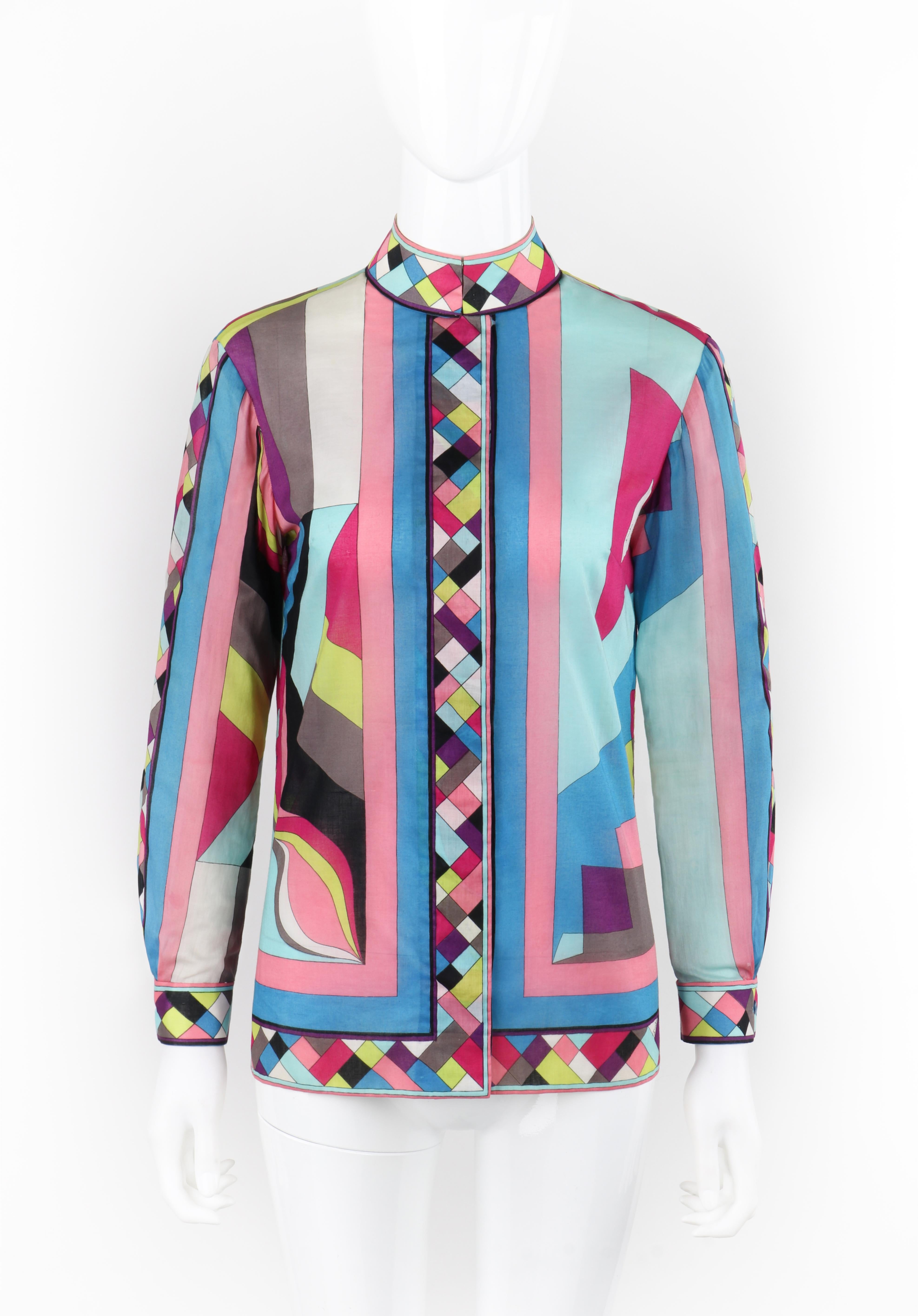 Brand / Manufacturer: Emilio Pucci
Circa: 1969
Designer: Emilio Pucci
Style: Button-Up Top
Color(s): Shades of blue, pink, purple, green, gray, black, white
Lined: No
Marked Fabric Content: 
