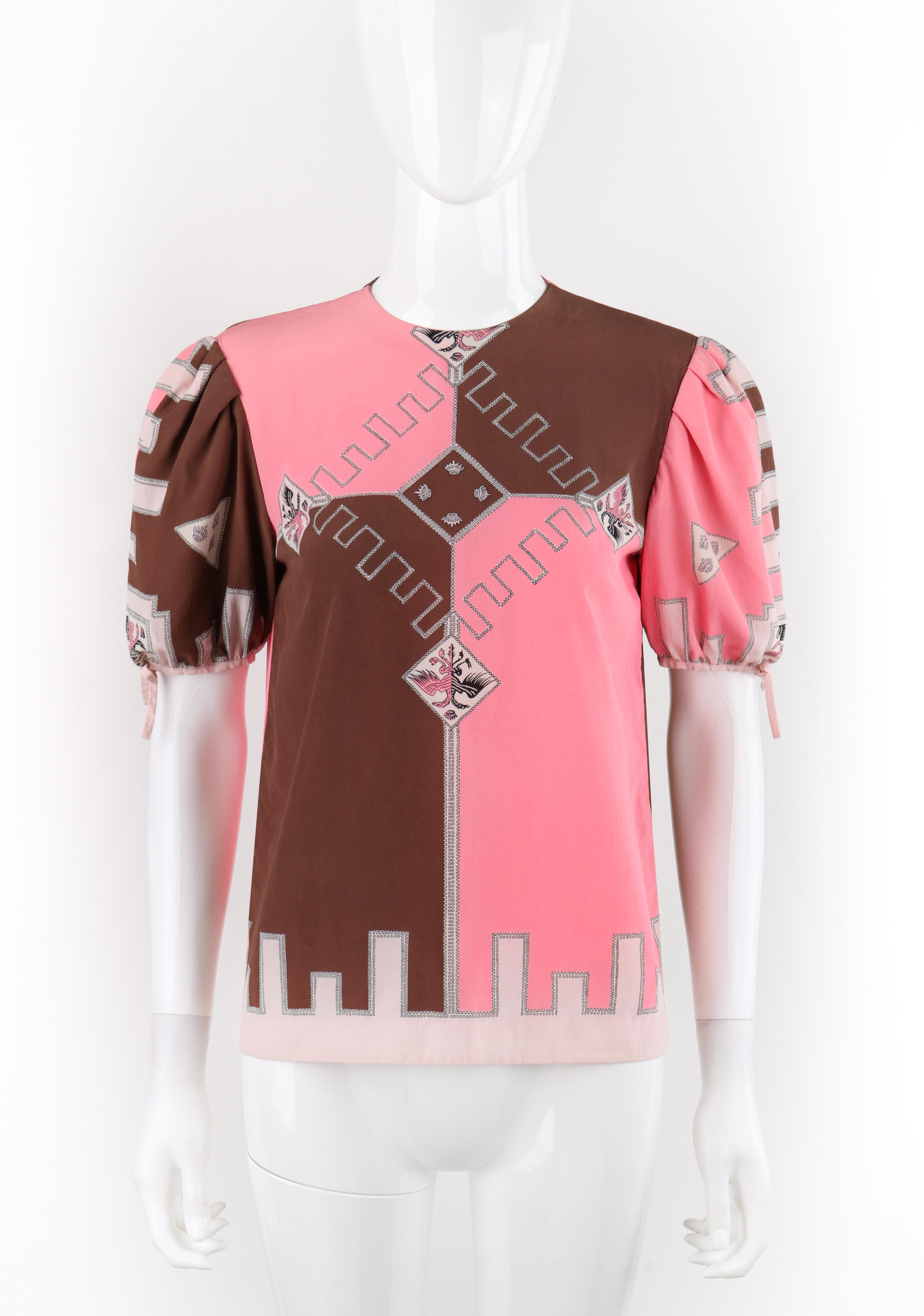 Brand / Manufacturer: Emilio Pucci
Circa: 1970s
Designer: Emilio Pucci 
Style: Blouse
Color(s): Shades of pink, brown, white, black
Lined: No
Marked Fabric Content: 