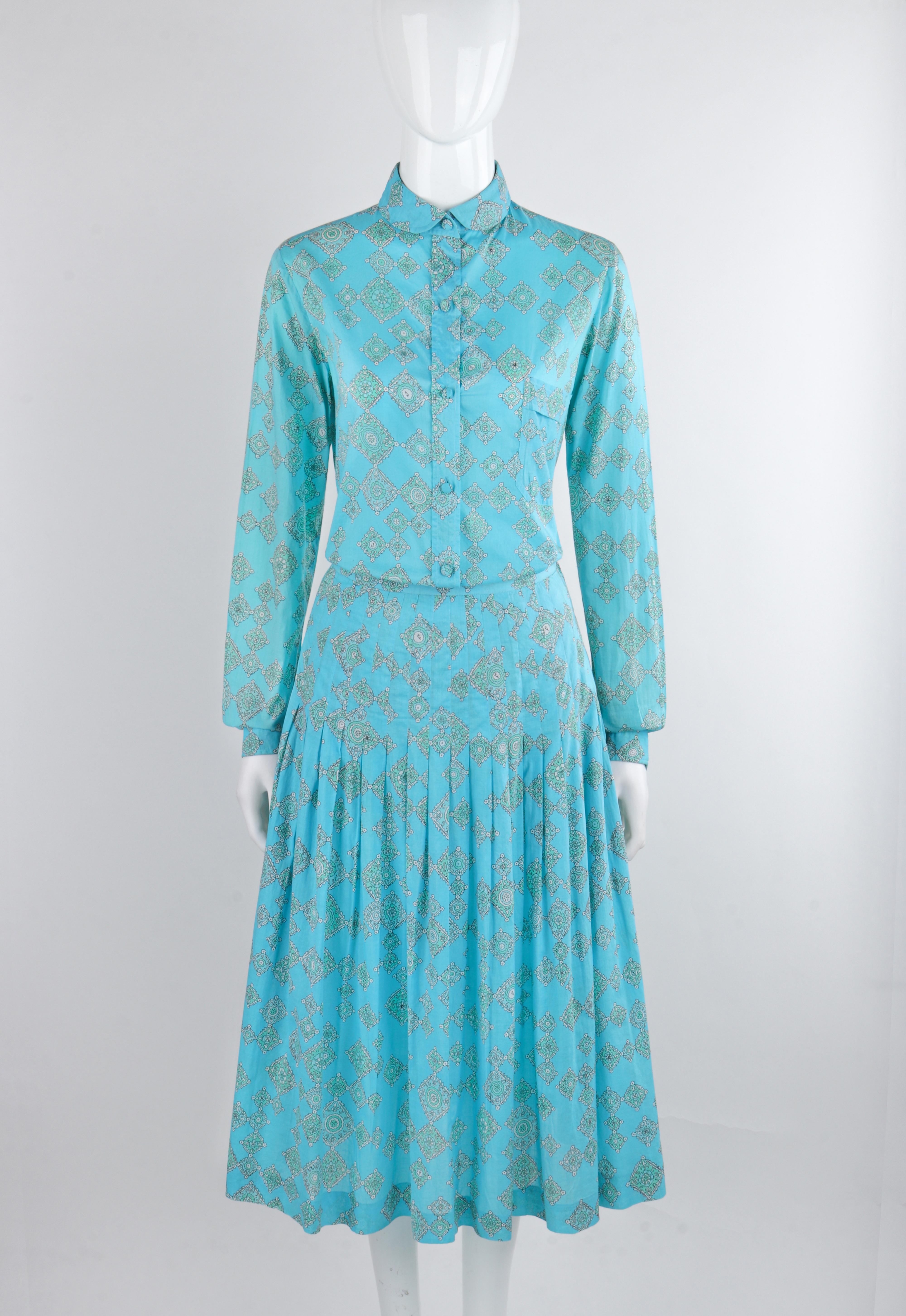 EMILIO PUCCI c.1970's Aqua Teal Printed Cotton Shirt & Pleated Skirt Dress Set

Circa: c.1970's
Label(s): Emilio Pucci; Saks Fifth Avenue Emilio Pucci Boutique
Designer: Emilio Pucci
Style: 2 piece shirt and skirt set
Color(s): Aqua/teal 
Lined: