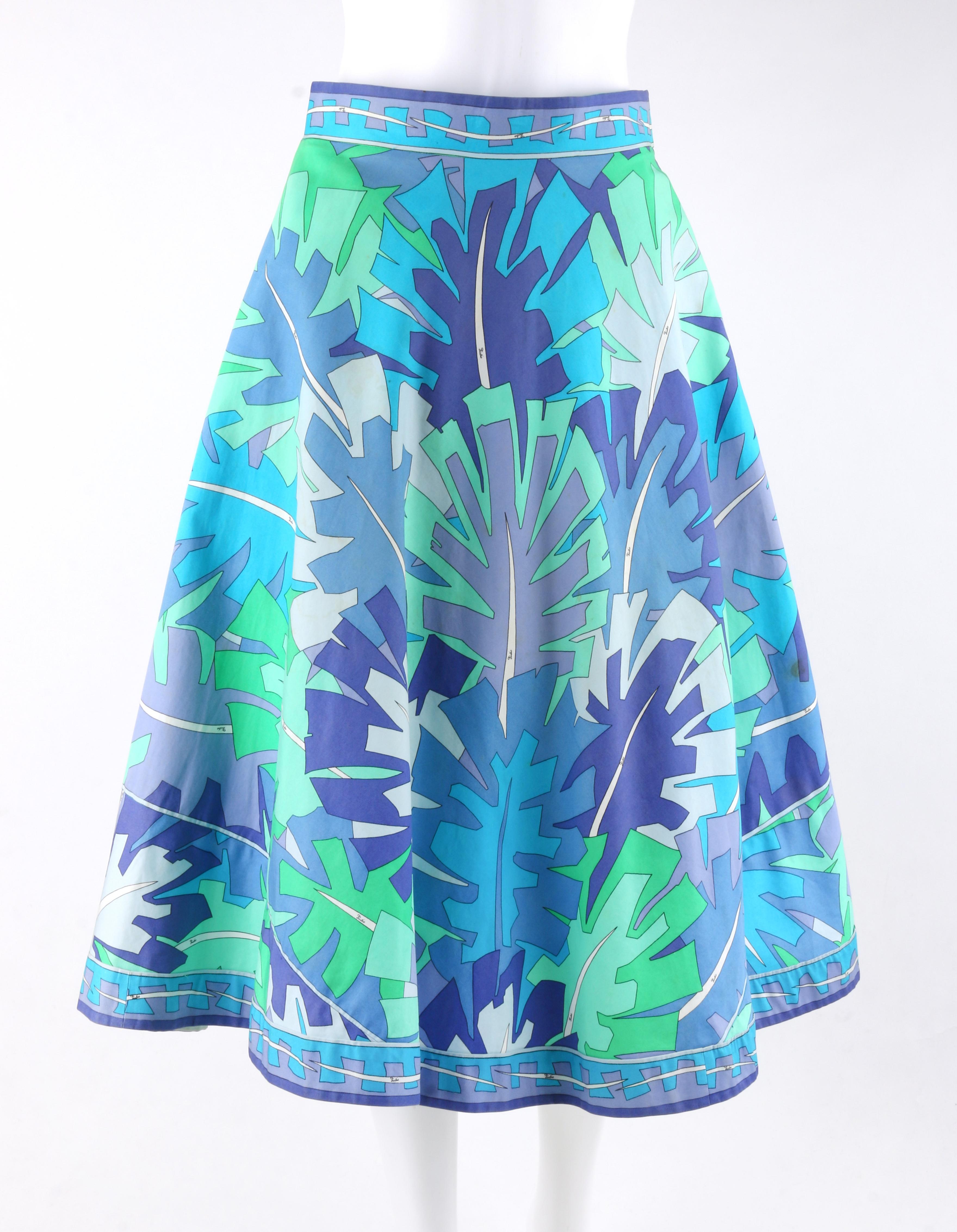 EMILIO PUCCI c.1970’s Multi-color Signature Leaf Print Flared Skirt

Circa: 1970’s
Label(s): Emilio Pucci / Exclusively for Sak’s Fifth Avenue  
Style: Flared skirt
Color(s): Shades of blue, green and purple. 
Lined: No
Marked Fabric Content: 100%