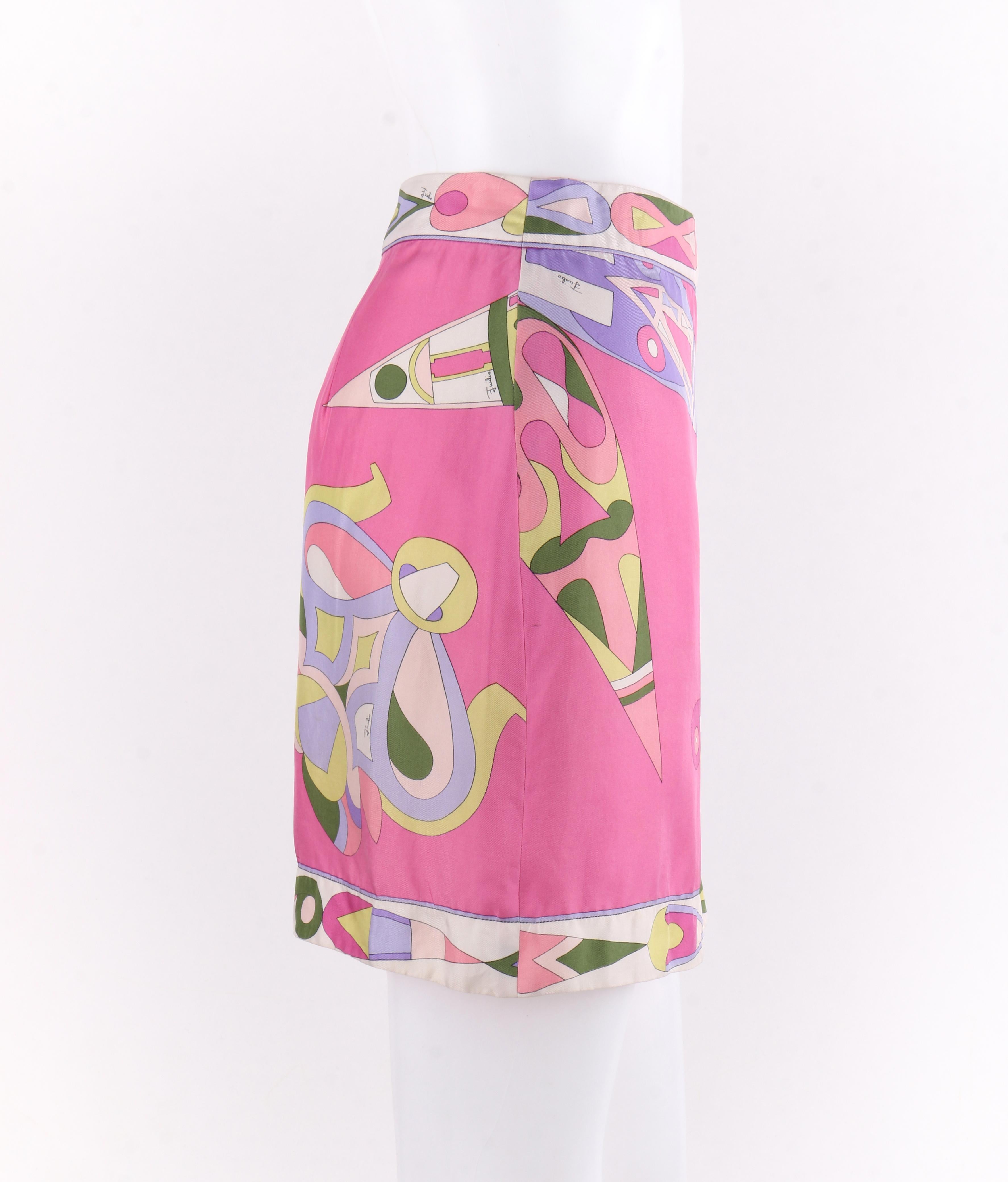 EMILIO PUCCI c.1970’s Pink Multi-color Signature Print Silk Wrap Skirt
 
Circa: 1970’s
Label(s): Emilio Pucci 
Style: Wrap mini skirt
Color(s): Shades of pink, purple, white, green and yellow. 
Lined: No
Marked Fabric Content: 100% Silk 
Additional