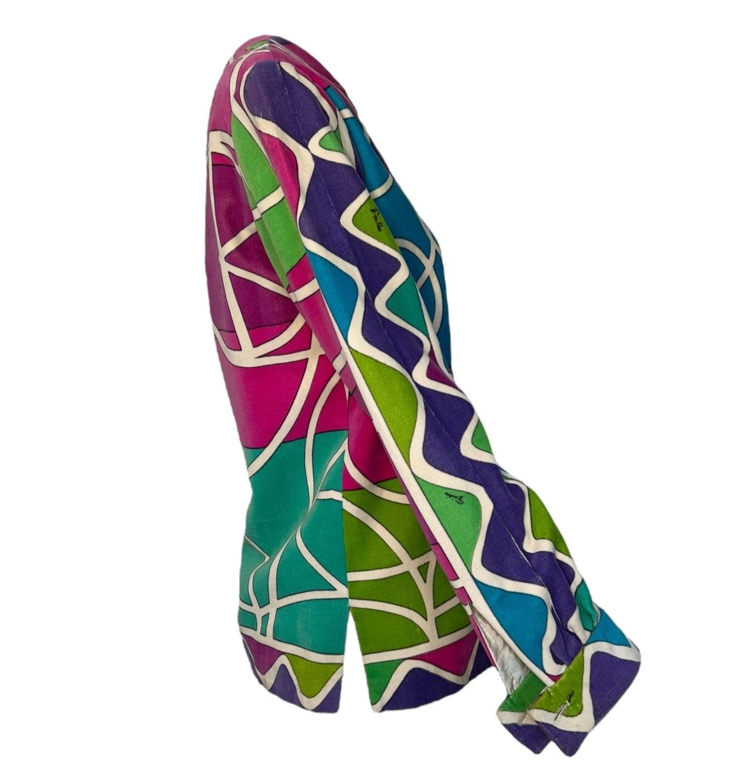 Lassen Sie sich in die 60er Jahre zurückversetzen mit diesem unglaublichen geometrischen, mehrfarbigen Top aus Baumwollsamt von Pucci. Buntes und leuchtendes Color-Blocking. Reißverschluss hinten. Guter Zustand mit einigen leichten Altersflecken,