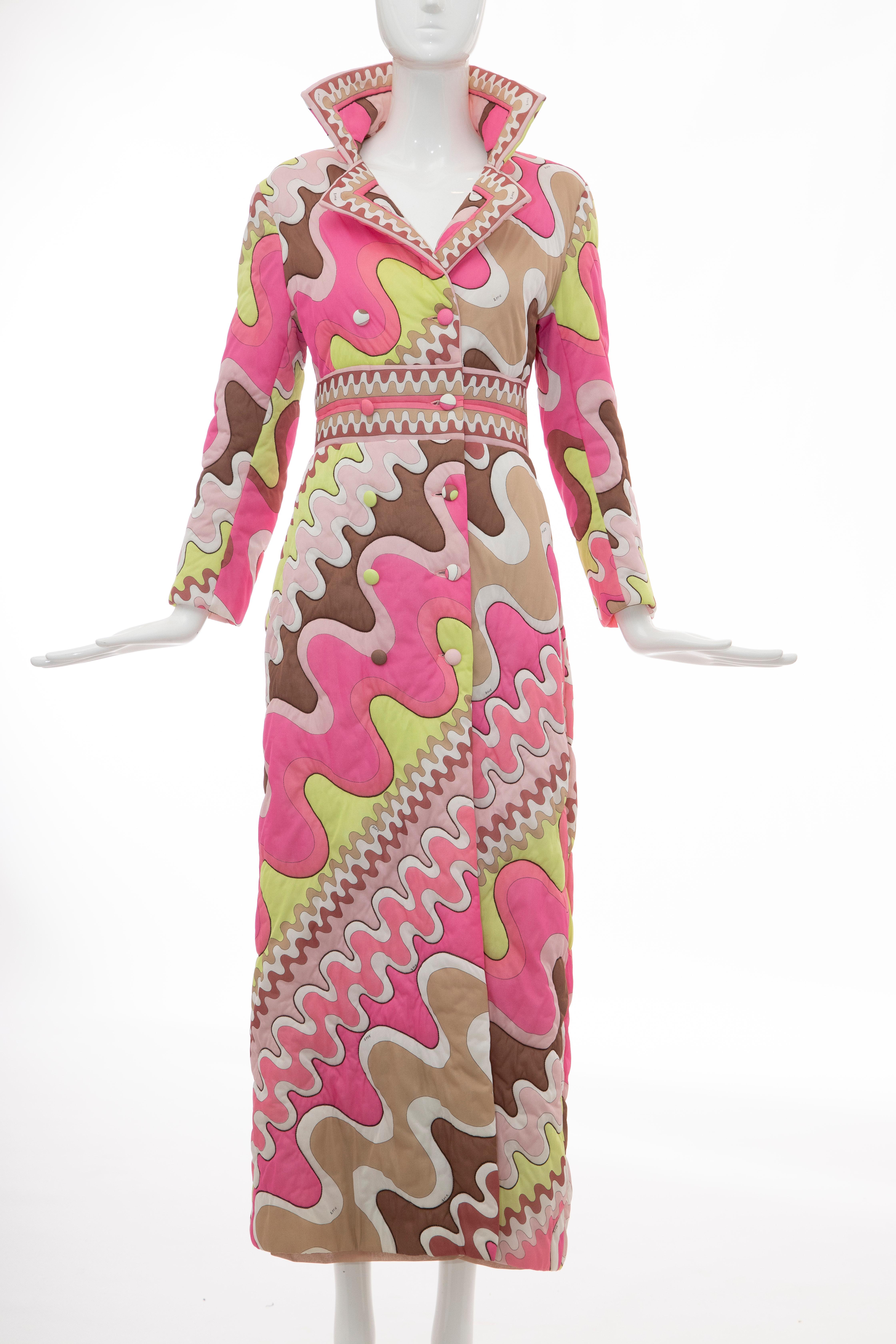 Emilio Pucci Formfit Rogers, Circa: 1970's long double-breasted quilted polyester coat with abstract print throughout, notched lapels, dual seam pockets and button closures at front.

Small
Bust: 36, Waist: 31, Shoulder: 16, Length: 53, Sleeve: 28
