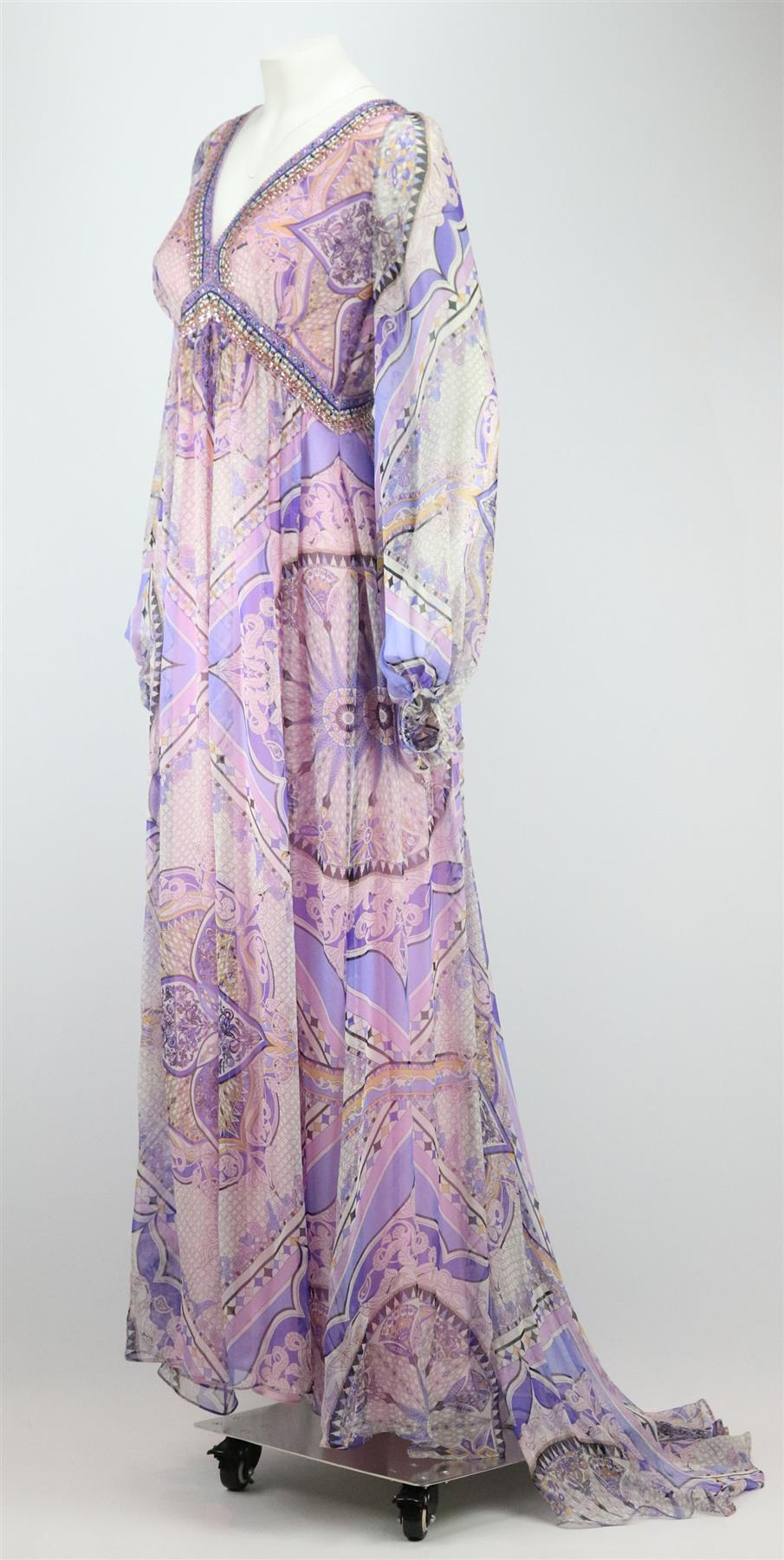 This gown by Emilio Pucci is decorated with the brand’s colourful iconic print, this silk-chiffon dress has a flattering v-neck silhouette and delicate crystals along the neckline. Multicoloured silk-chiffon. Concealed zip fastening at back. 100%