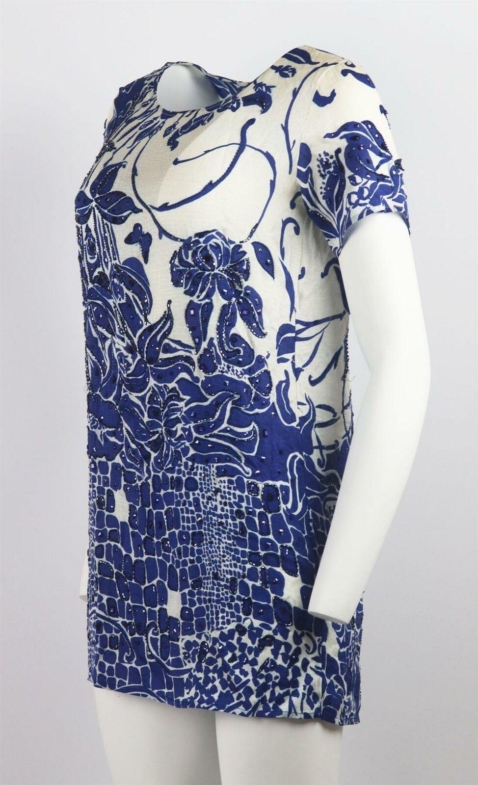 This dress by Emilio Pucci is filled with delicate, lingerie-inspired designs, it has been made in Italy from bead embellished floral-printed silk and cut for a short sleeve mini silhouette.
Ecru and blue silk.
Slips on.
100% Silk.

Size: IT 38 (UK