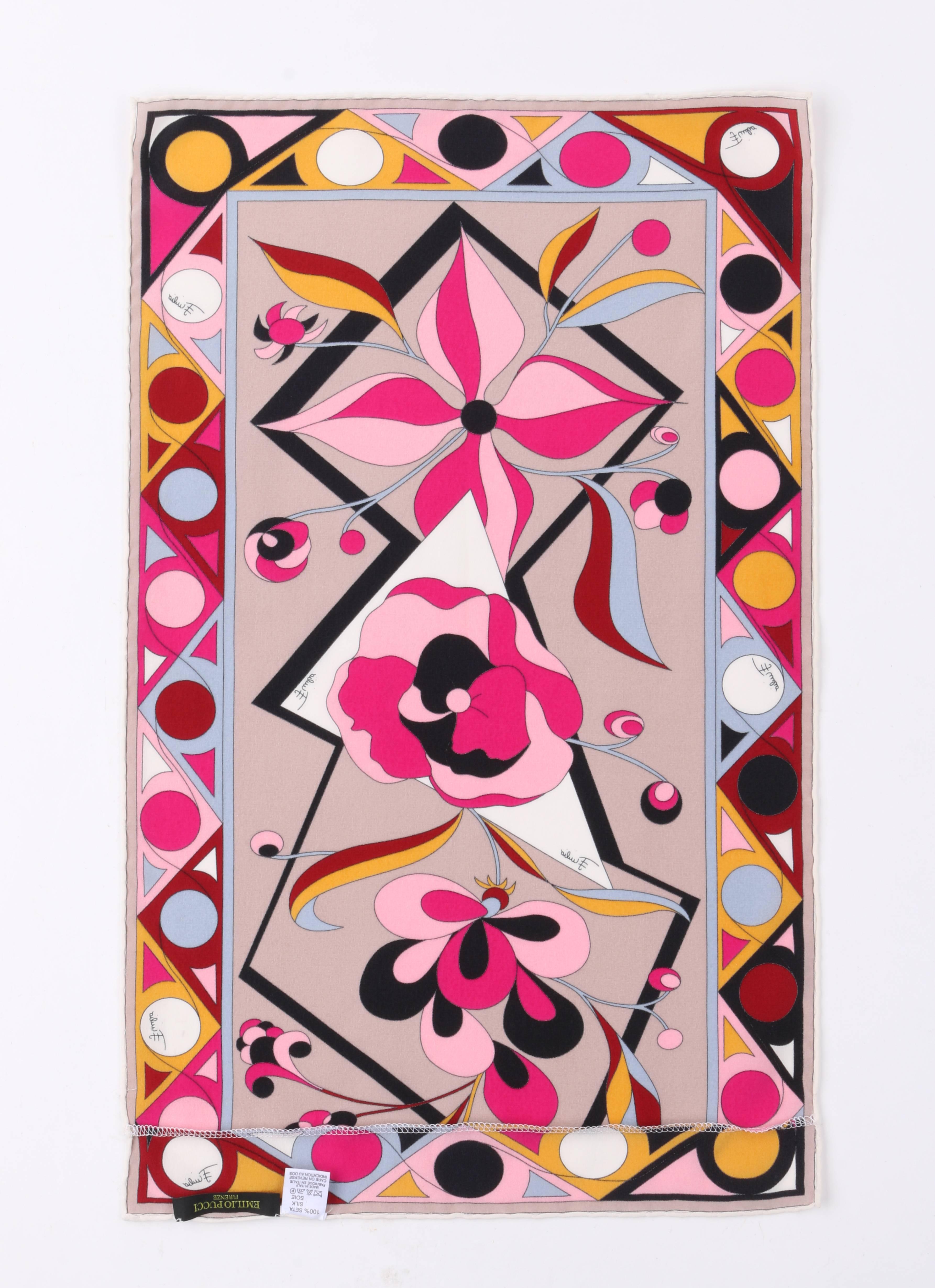 Emilio Pucci Firenze fuchsia mutli-color floral signature print oblong silk scarf. Multi-color geometric boarder print surrounded by a gray thin outer boarder. Gray center with multi-color large floral print in shades of fuchsia pink, white, black,