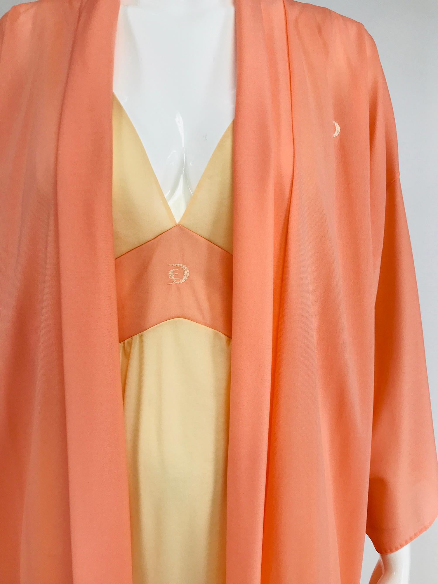 Emilio Pucci for Formfit Rogers 2pc. peignoir in sheer coral & taupe nylon. Long kimono sleeve wrap front gown, the belt is missing, in coral. The matching night gown is pull on with a V neckline front and back, high waist band and slightly full