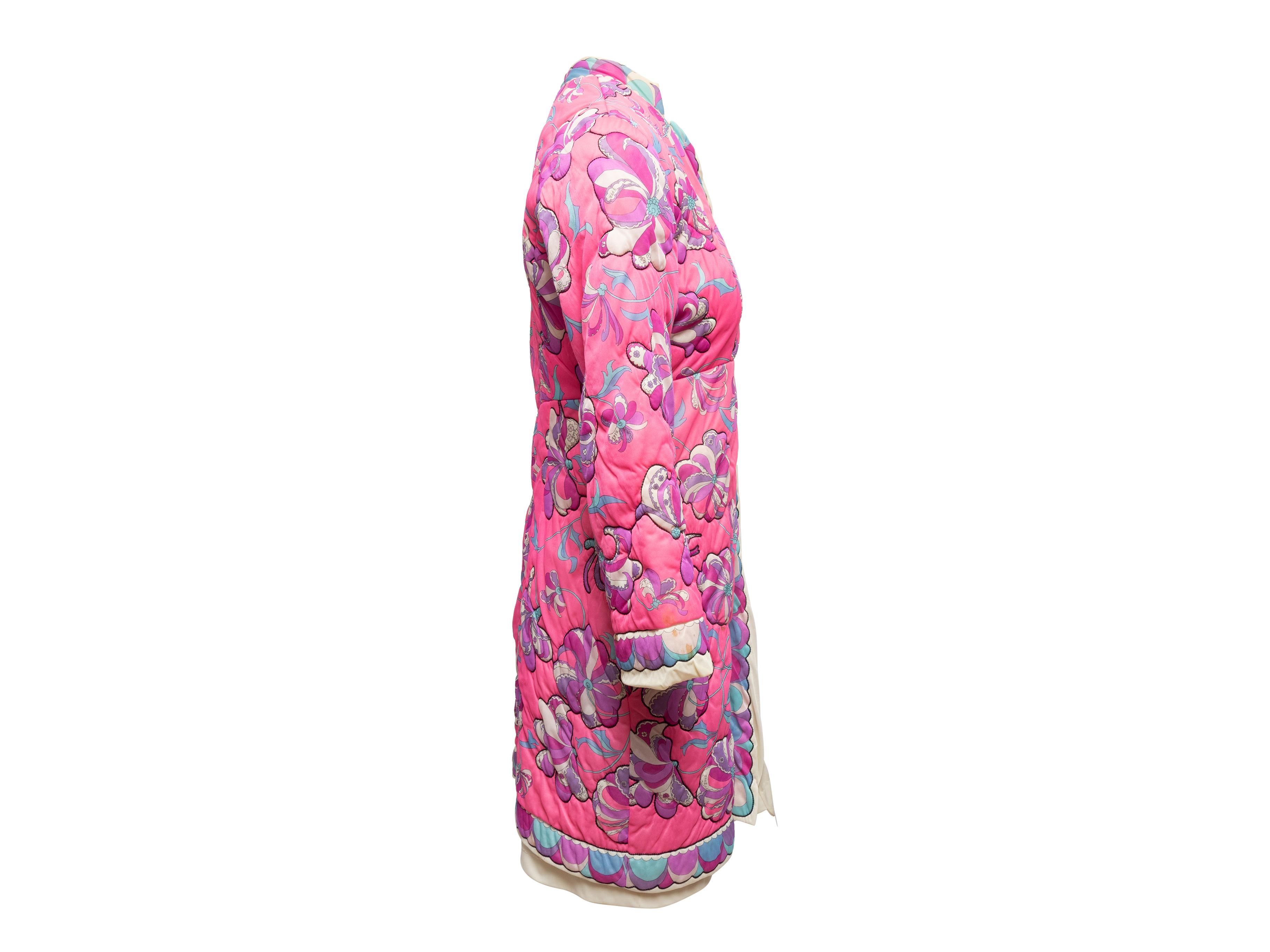 Product Details: Vintage pink and multicolor floral print house coat by Emilio Pucci for Formfit Rogers. Mandarin collar. Button closures at center front. 34