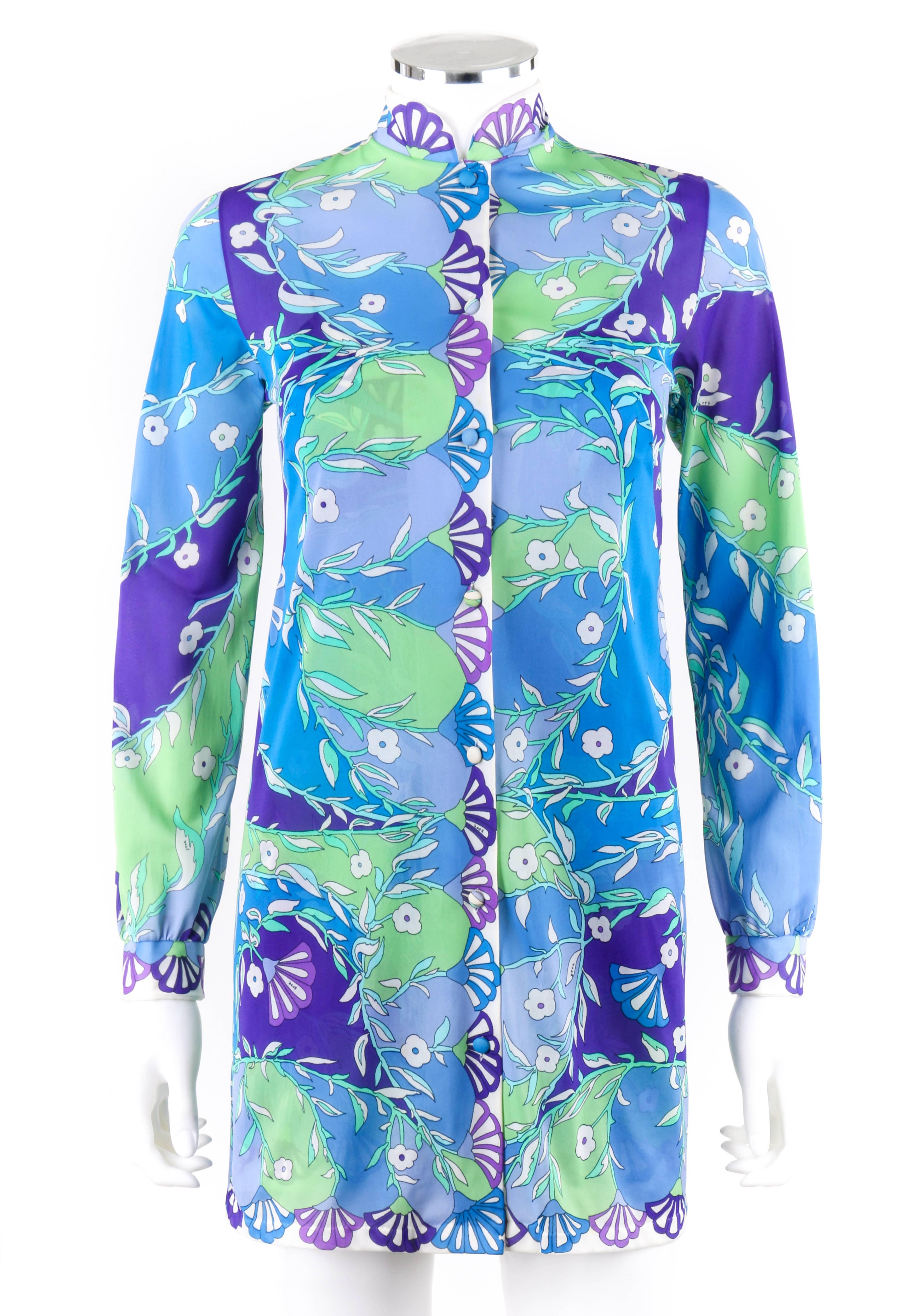 Vintage Emilio Pucci for Formfit Rogers c.1960's two piece blue floral print shirt and slip dress set. Multi-color signature floral color blocked print knit in shades of blue, green, purple, and white. Mandarin collar shirt. Seven center front