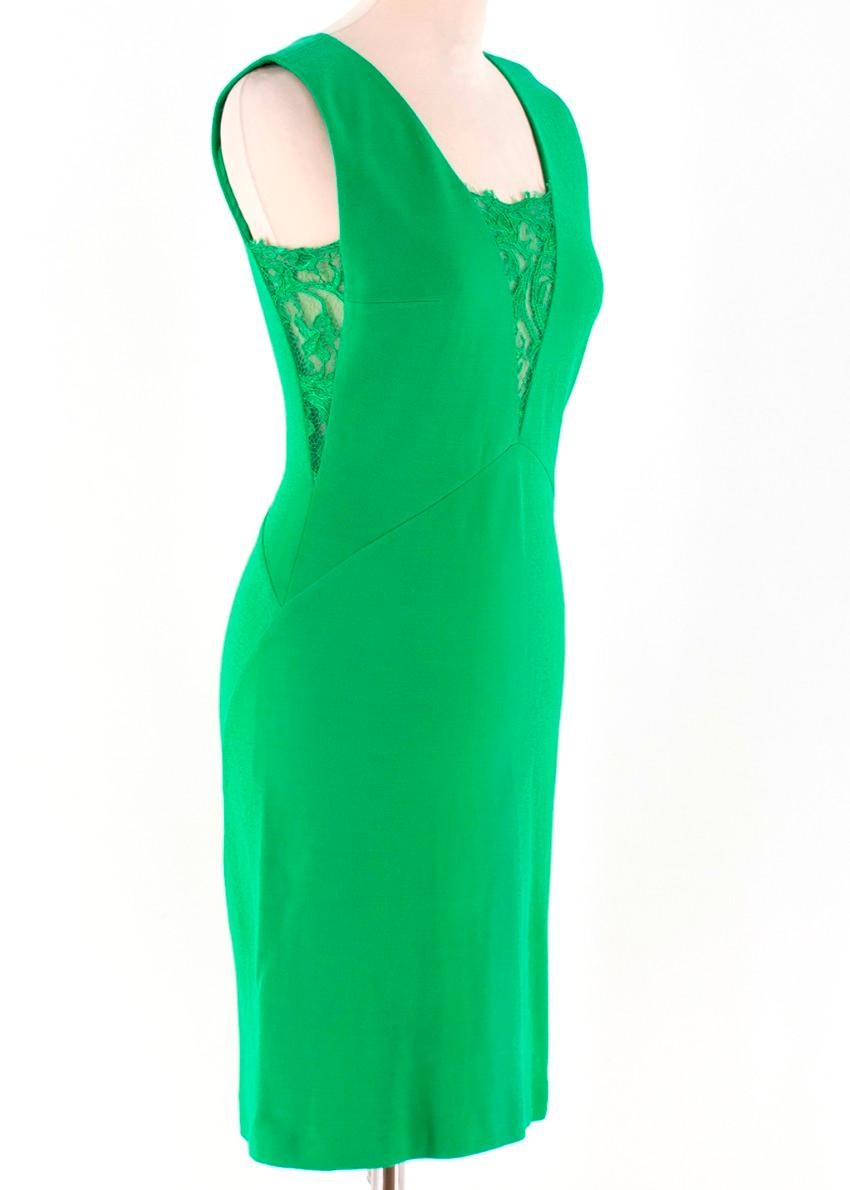 Emilio Pucci Green Fitted Dress

-Green fitted dress with lace detailing
-V neck
-Mini dress
-Back zip closure
-Tailored around the bust and waist

Please note, these items are pre-owned and may show signs of being stored even when unworn and
