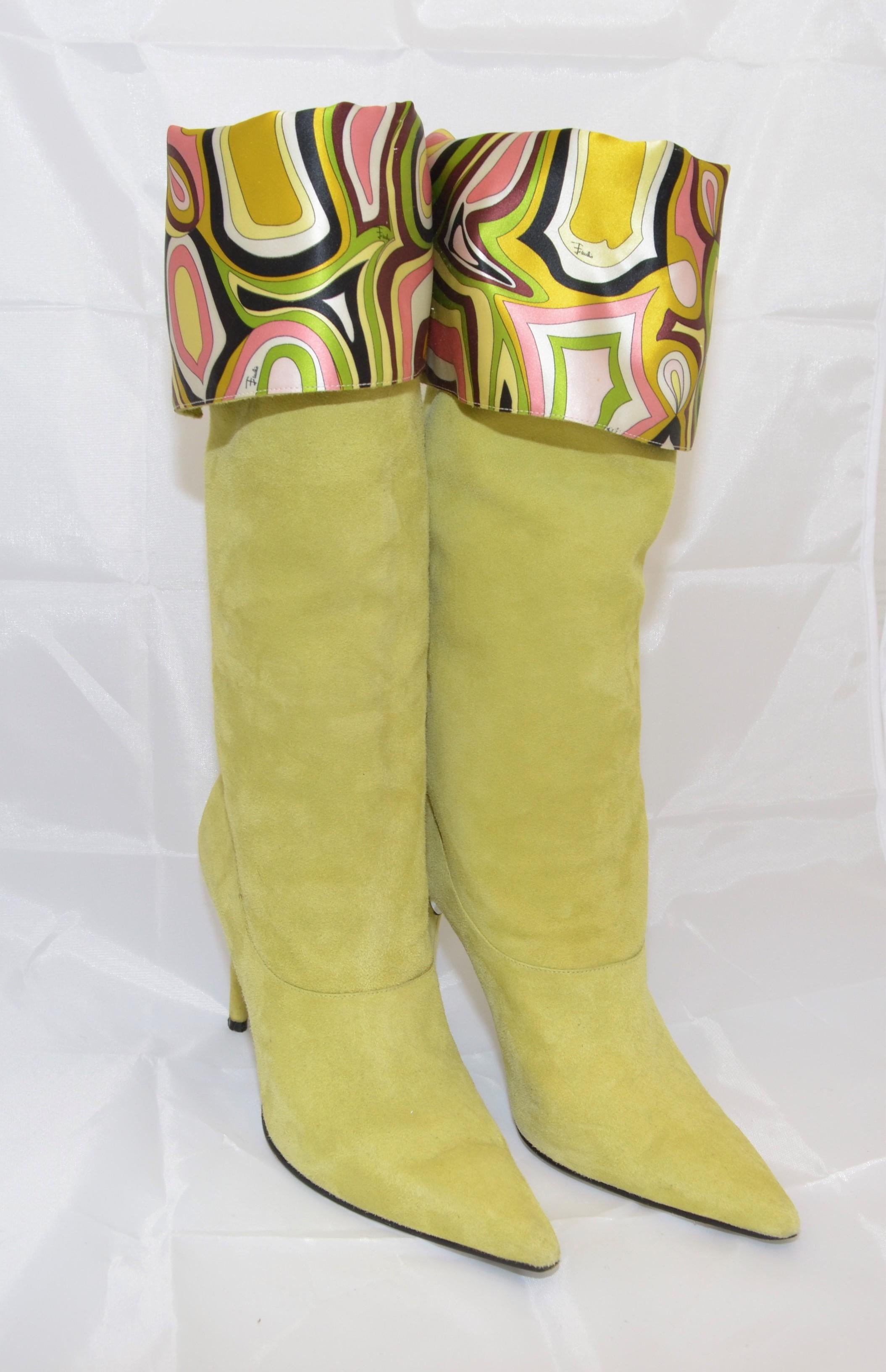 Emilio Pucci lime green suede boots features a pointed toe with a printed silk lining. Boots have a slip-on entry, size 39.5. Great pre-owned condition with faint wears to the suede as pictured.

Heel Height - 4''
Shaft - 13''