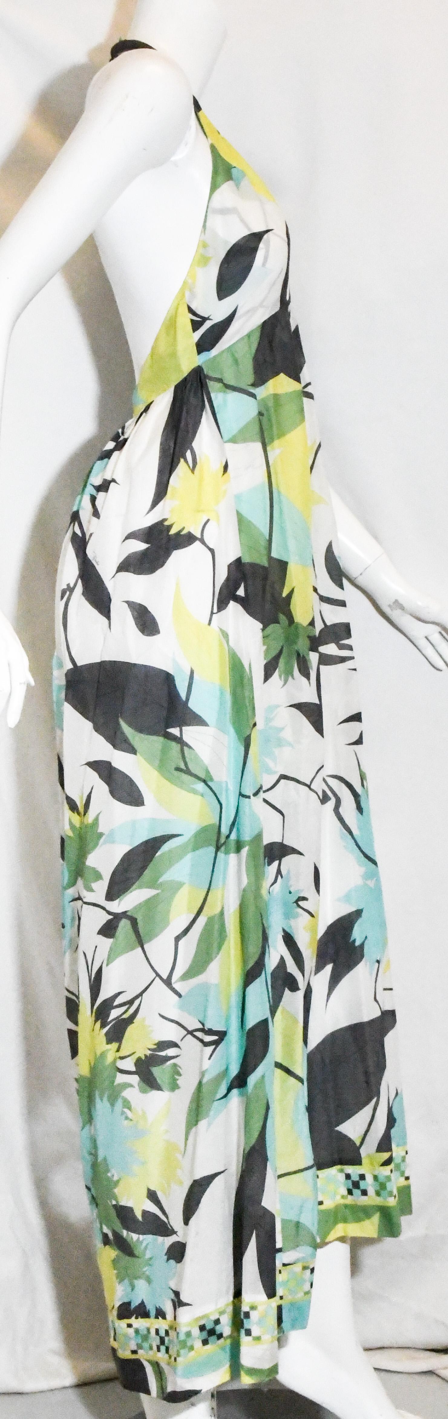 Emilio Pucci halter V neck abstract floral print dress with bare back and asymmetric hemline.  This dress is shorter at front with gathered skirt.  Enjoy this dress for day or night, casual and classy.   Dress is in excellent condition.  Made in