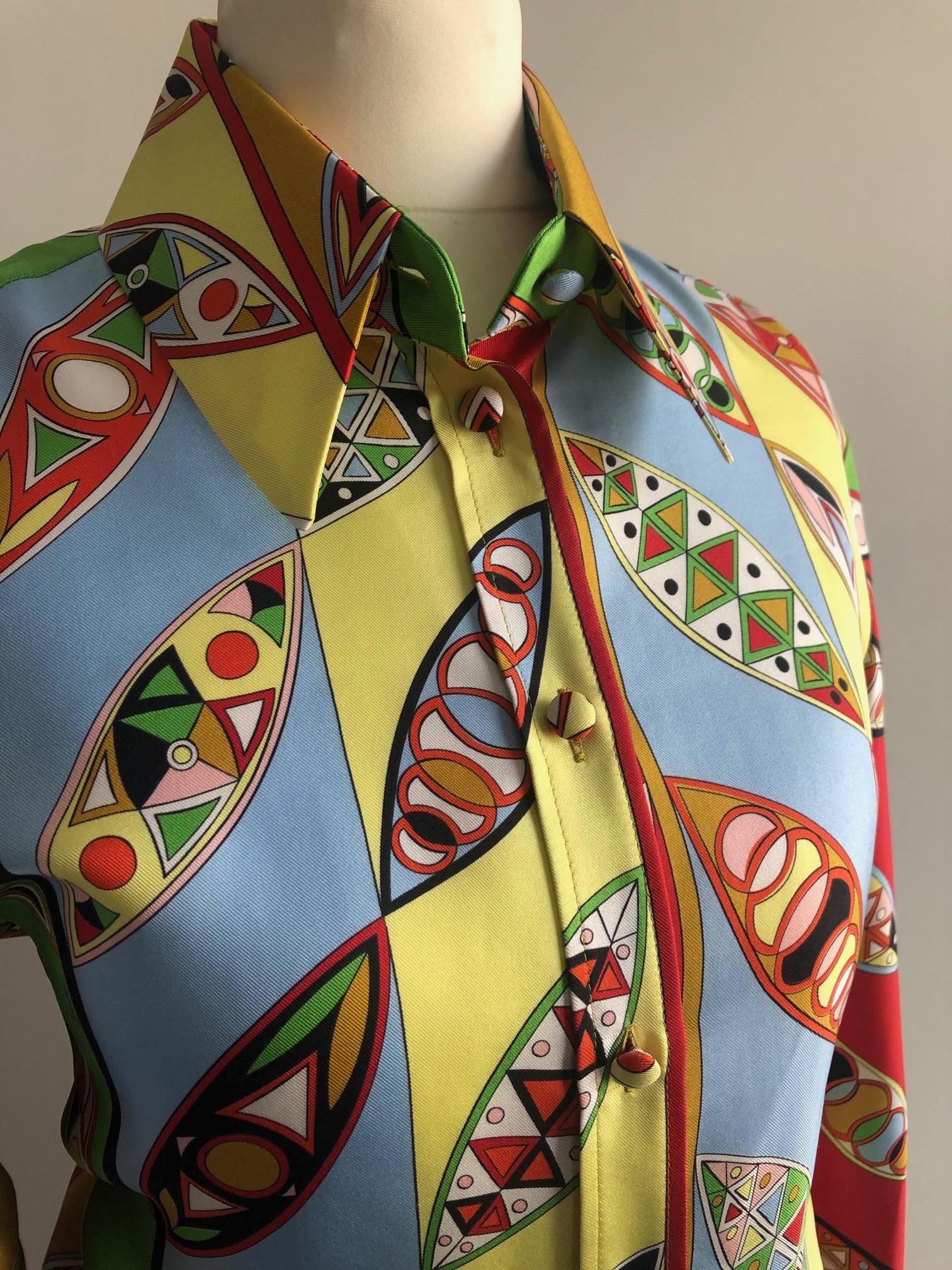 EMILIO PUCCI Iconic Printed Fitted silk-twill Pucci shirt

Iconic vibrant Emilio Pucci fitted shirt. Handcrafted from silk-twill, geometric motifs patterned from Emilio Pucci 1966 archives. In To wear every day with skirt, trousers...The YSL vintage
