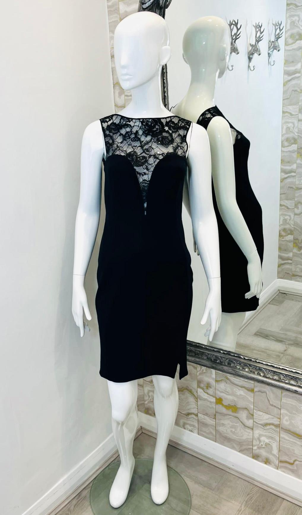 Emilio Pucci Lace Embellished Sheath Dress

Black, mini dress detailed with floral lace, boat neckline top.

Designed with padded bra, slit to the side and open back.

Size – 40IT

Condition – Excellent

Composition – 75% Viscose, 25% Nylon; Lining