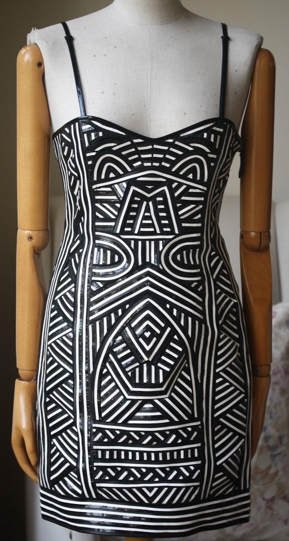 The Emilio Pucci women’s leather-paneled stretch-mesh mini dress features shoulder strap, slim fit, lined, fully lined. The Emilio Pucci mini dress is made from elastane, leather, nylon, silk. 

Size - IT 40 (UK 8, US 4, FR 36)

Condition: New with