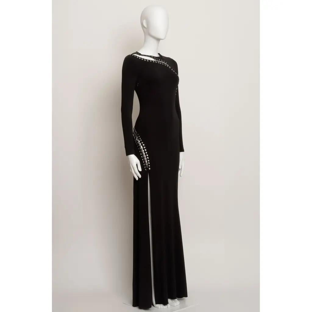 EMILIO PUCCI BLACK JERSEY CREPE LONG DRESS WITH SILVER METAL LACE UP DETAILS SIZE 40 IT

Emilio Pucci long length gown in black crepe jersey. 
Fitted body with long slim sleeves. Silver metal lace up details. Slit at front to thigh. 

In very good