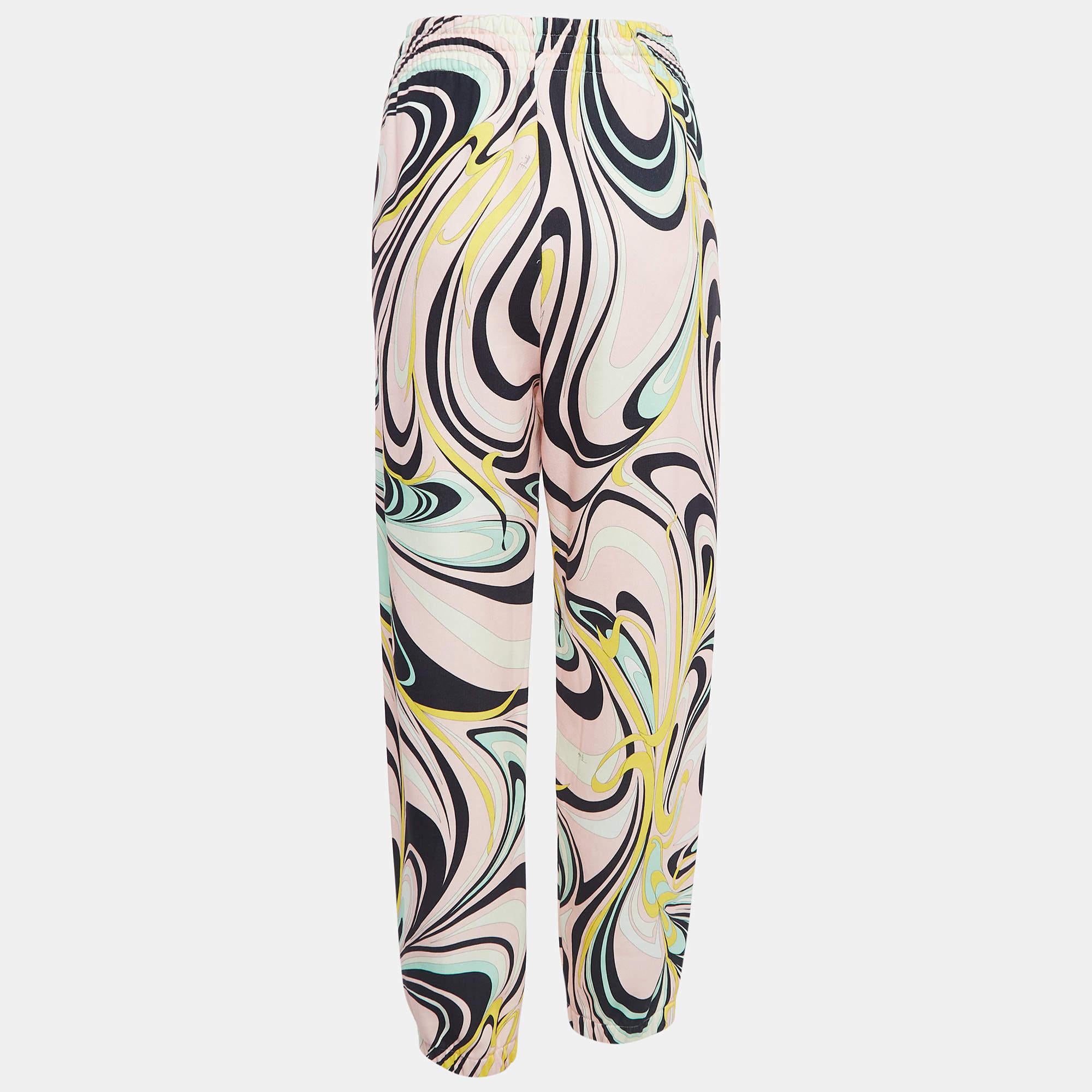 Track pants like these from Emilio Pucci are a fine addition to any wardrobe. They are made from cotton and showcase signature prints.

