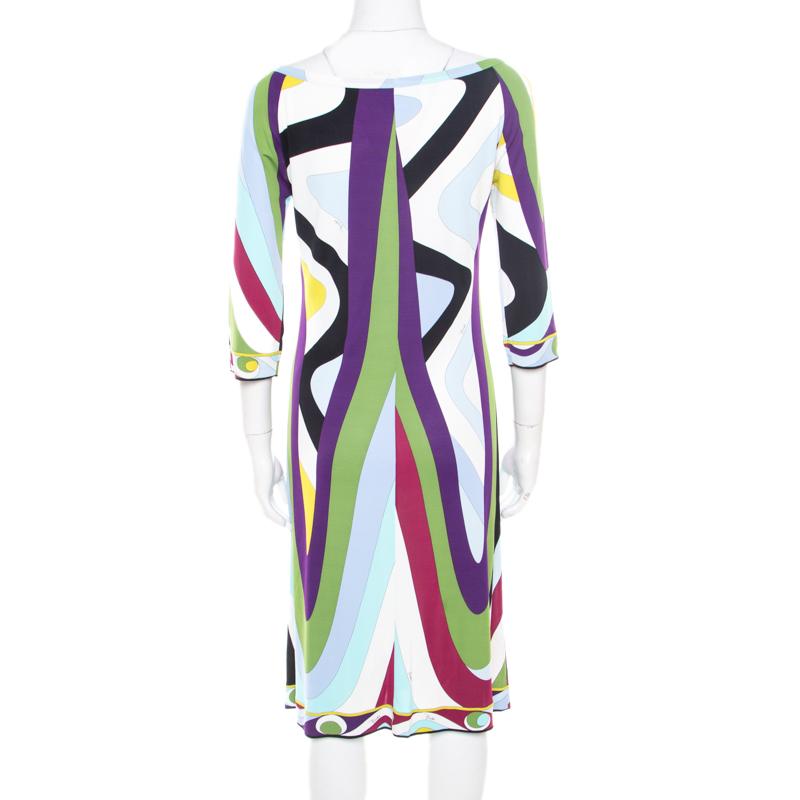 How lovely is this Emilio Pucci dress! It is made of 100% rayon and features a multicolour print all over it. It flaunts a boat neckline and three-quarter sleeves. Pair it with neutral pumps and a sling bag for a fashionable day out.

Includes: The