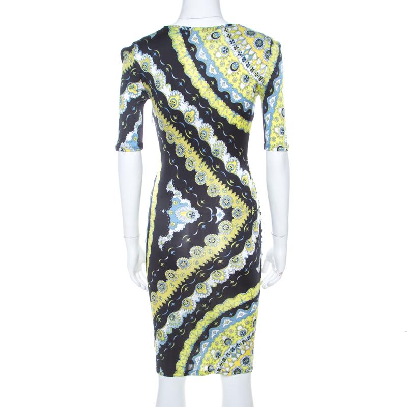 This lovely creation of this Emilio Pucci dress stands out. Style this multicolour dress with fun accessories to create a fashion-forward look. Feminine and stylish, this printed outfit with a plunging neckline is a masterpiece in any fashionista's