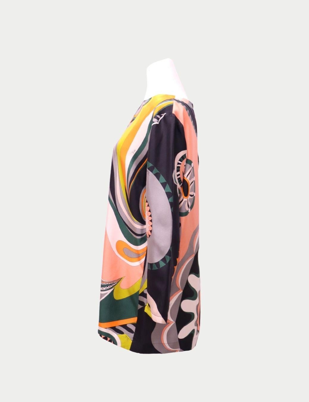 Emilio Pucci Multicolor Silk Tunic Top – Signature Psychedelic Print

Celebrate color, movement, and unmistakable Italian glamour with this Emilio Pucci Multicolor Silk Tunic Top. Crafted in luxurious silk, the piece features Pucci’s iconic swirling