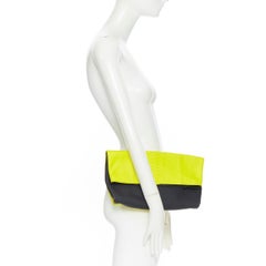 EMILIO PUCCI neon yellow scaled pleather black rubber fold over clutch bag
