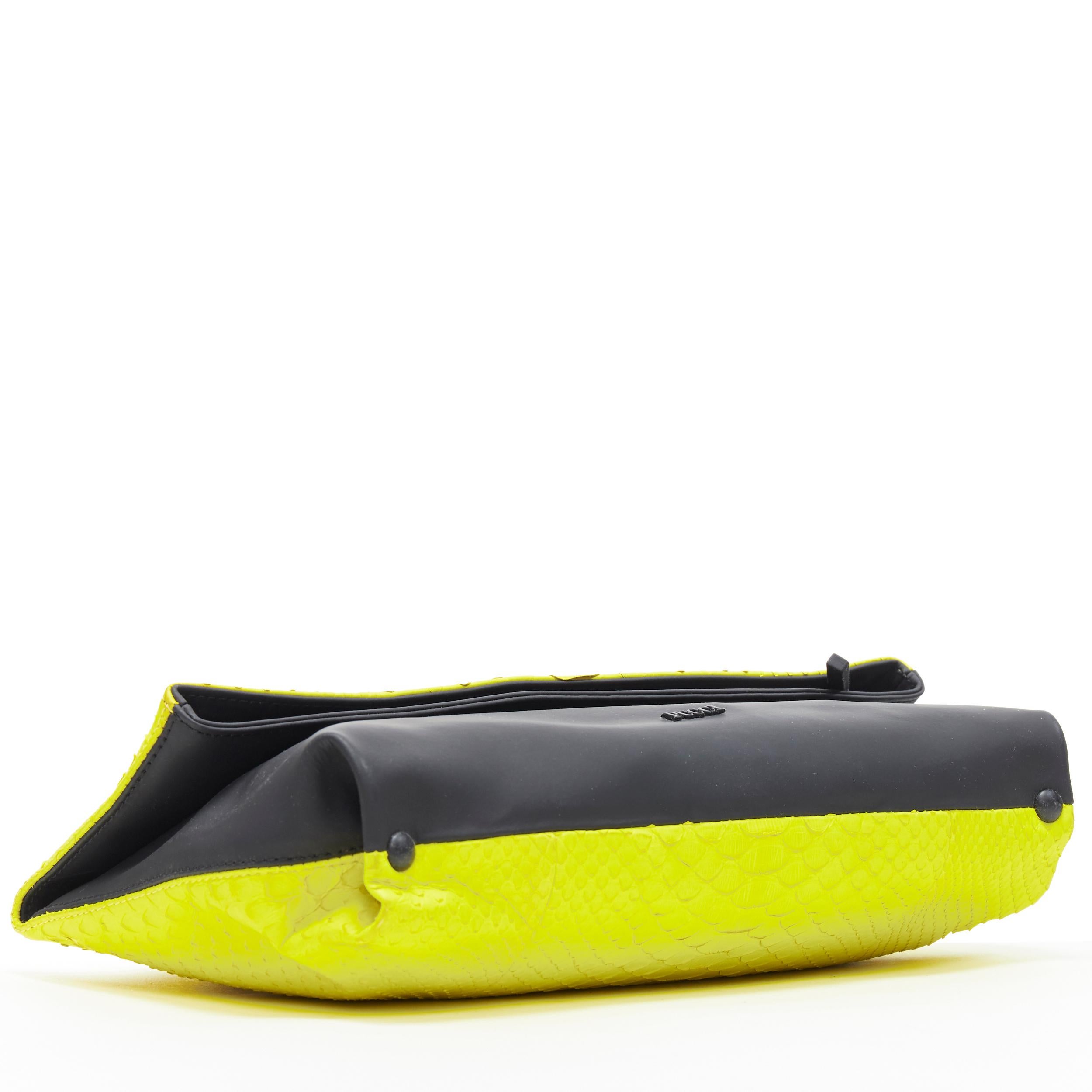 black yellow clutch bag