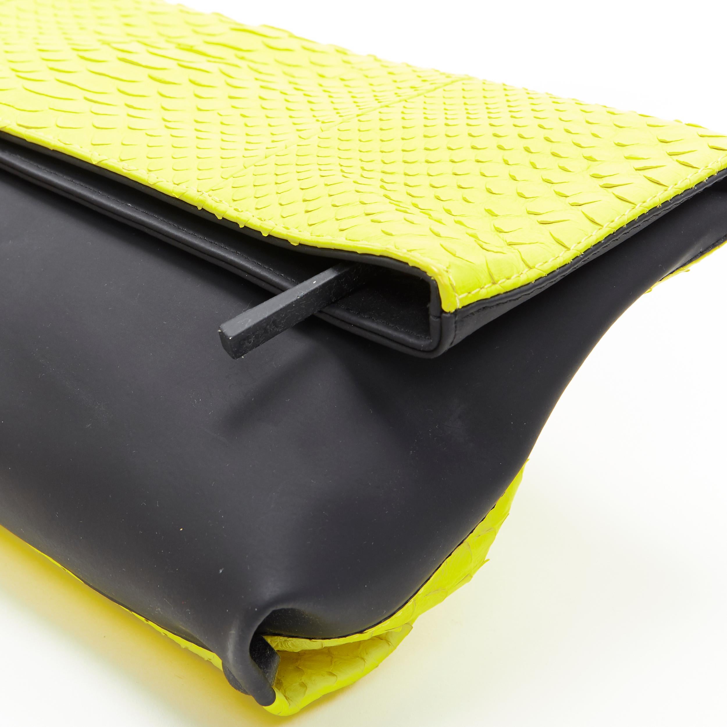 Black EMILIO PUCCI neon yellow scaled pleather black rubber fold over clutch bag