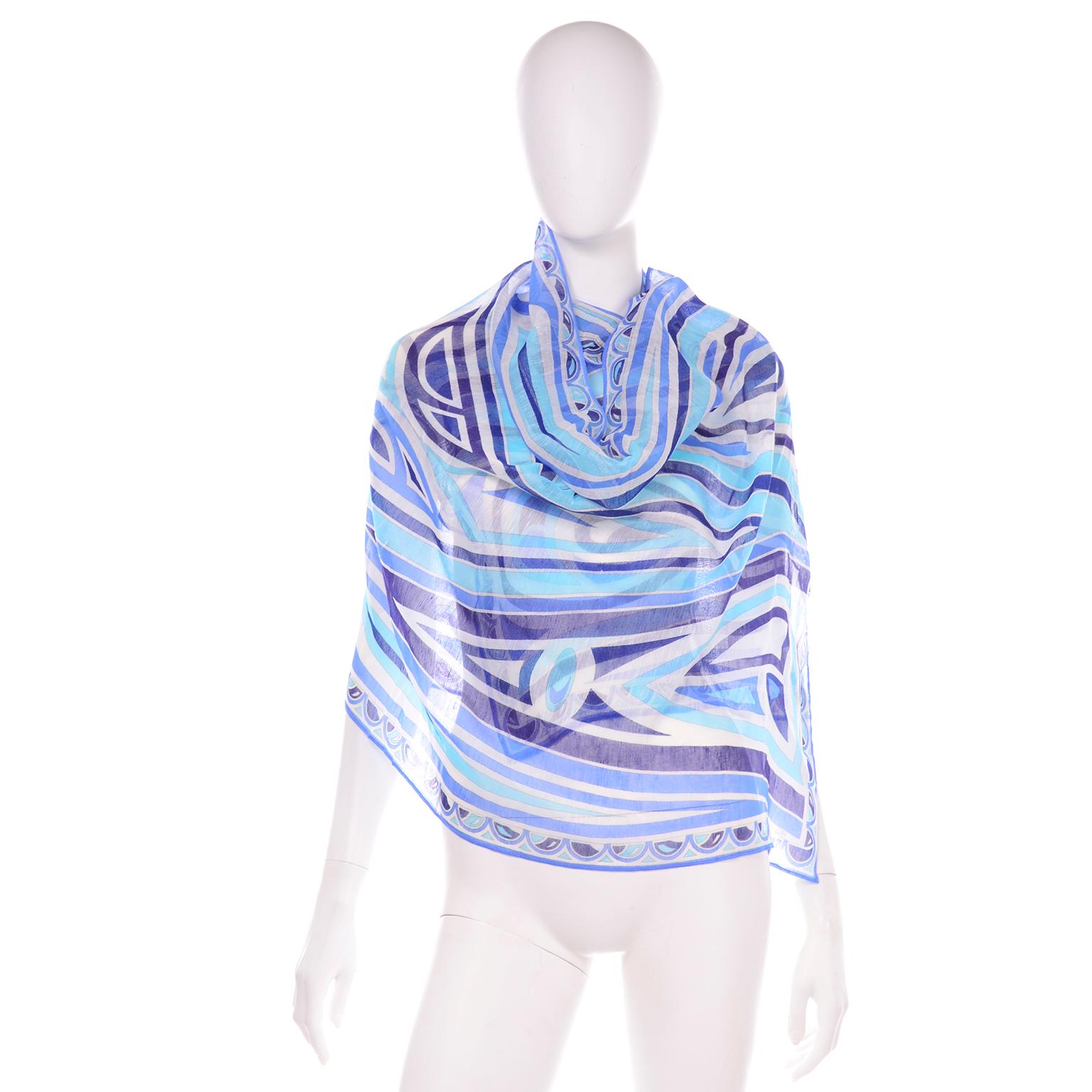 This Emilio Pucci scarf is brand new and comes with its original box! The abstract blue print fabric is 65% Linen and  35% Cotton. Made in Italy.

LENGTH: 72