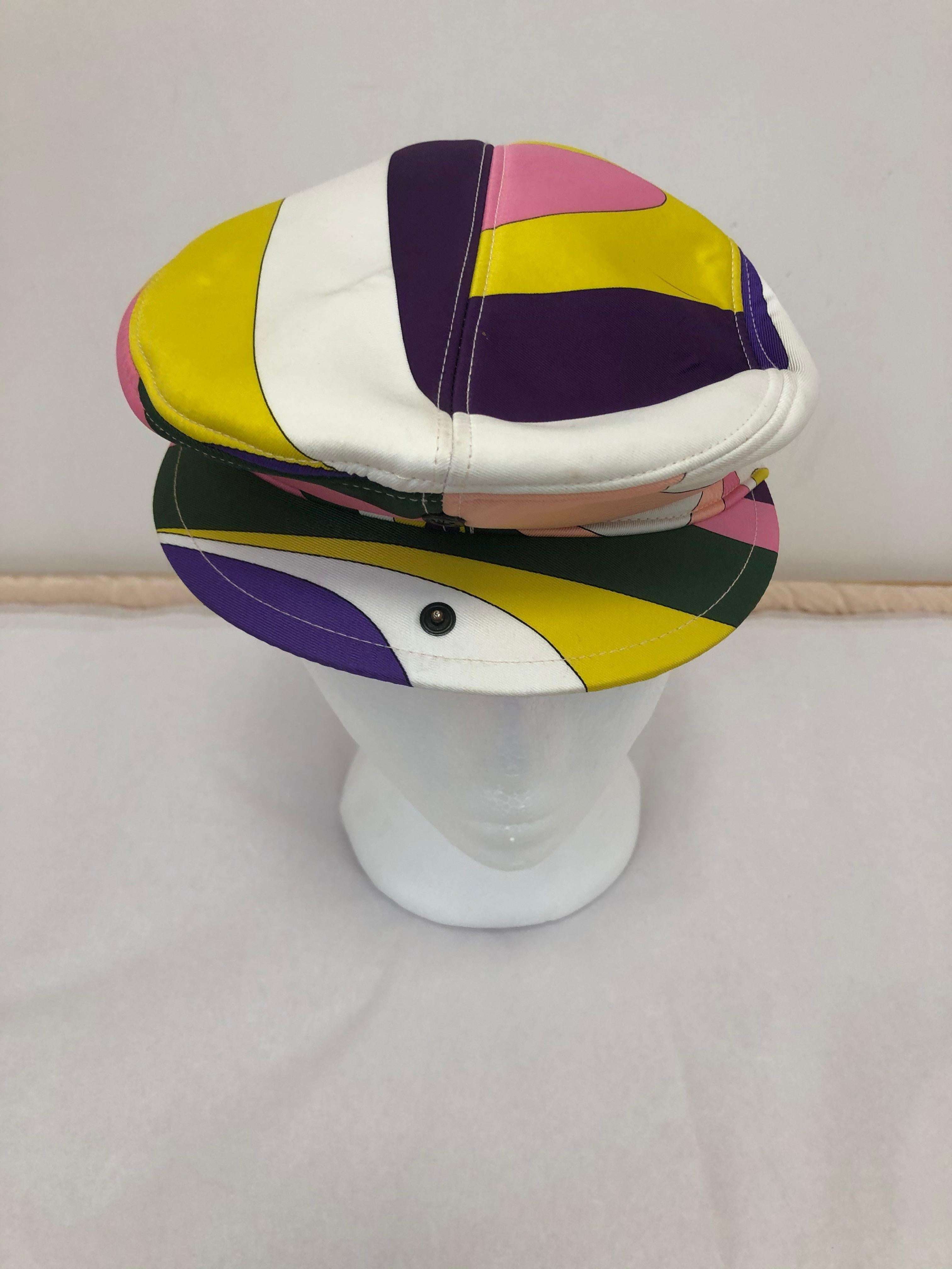 Newsboy cap with a difference as there is a snap in front which allows you to extend the hat. It is an iconic Pucci print and very versitile.