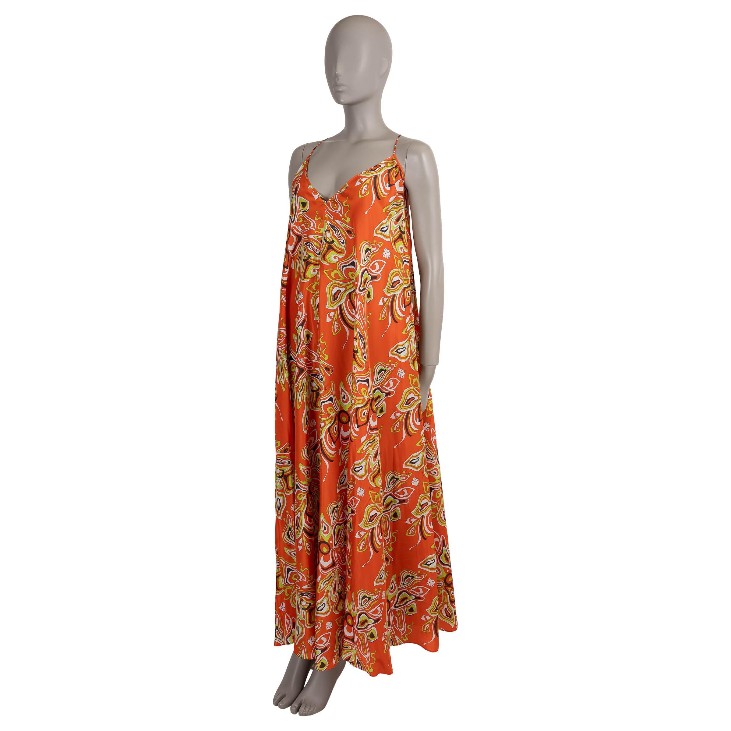 This 100% authentic Emilio Pucci dress is crafted in vibrant orange poplin cotton (content and size tag missing). Designed with a relaxed, A-line silhouette, it features a tiered maxi-length skirt, deep V-neckline at both the front and back, and