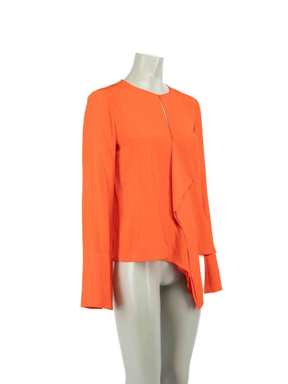 CONDITION is Very good. Hardly any visible wear to blouse is evident on this used Emilio Pucci designer resale item.
 
 
 
 Details
 
 
 Orange
 
 Silk
 
 Blouse
 
 Drape detail
 
 Long sleeves
 
 Round neck
 
 Front keyhole
 
 Back zip and hook
