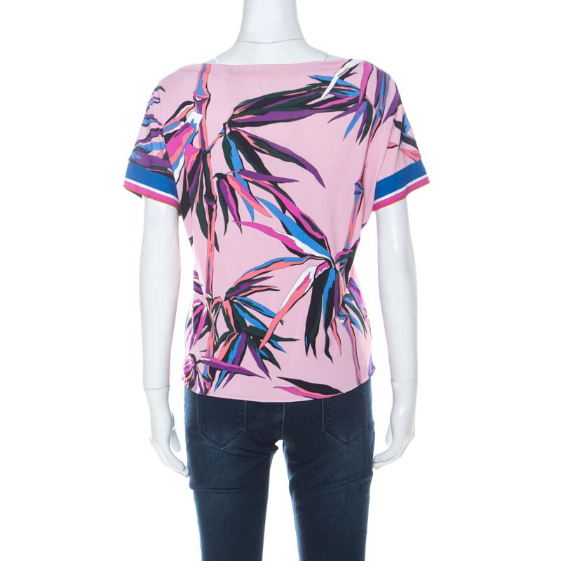 An example of quality and comfort, this Emilio Pucci T-shirt will lend a subtle edge to your dressing. This pink piece is made from quality fabrics and it features short sleeves and prints of bamboo trees all over.

Includes: The Luxury Closet