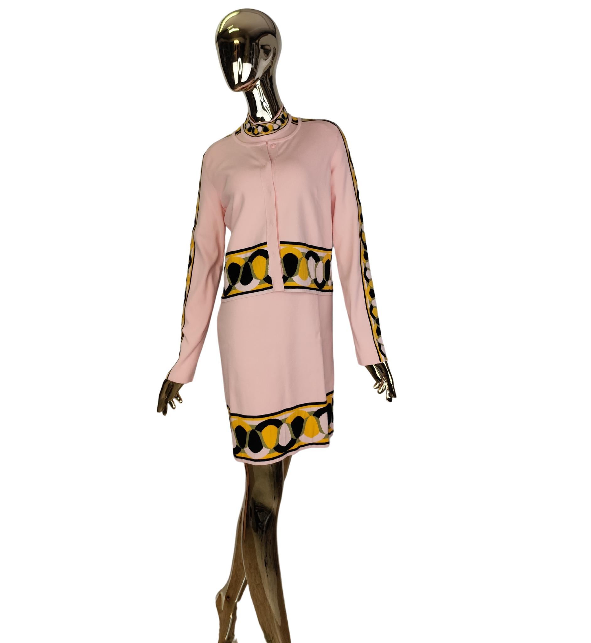 Emilio Pucci dress and cardigan set
Pink with yellow, green and black design
Hidden buttons closure on cardigan
Composition label missing, stretchy cotton blend

Marked size L

Dress measurements:
bust up to 108 cm - 42.5 in
waist up to 110 cm - 43