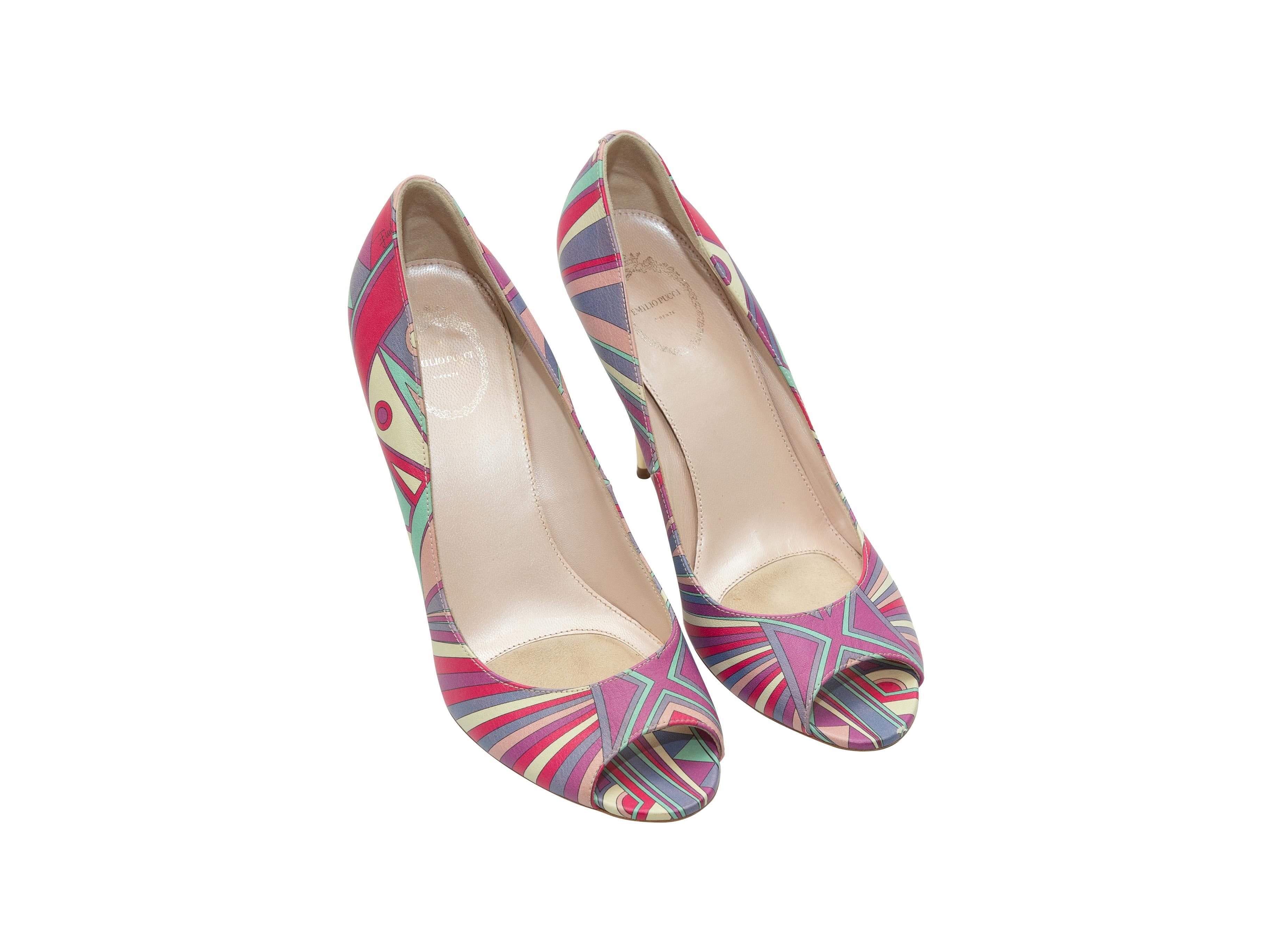 Product details: Pink and multicolor abstract print peep-toe pumps by Emilio Pucci. Stacked wood and mirrored heels. Designer size 40. 4.5